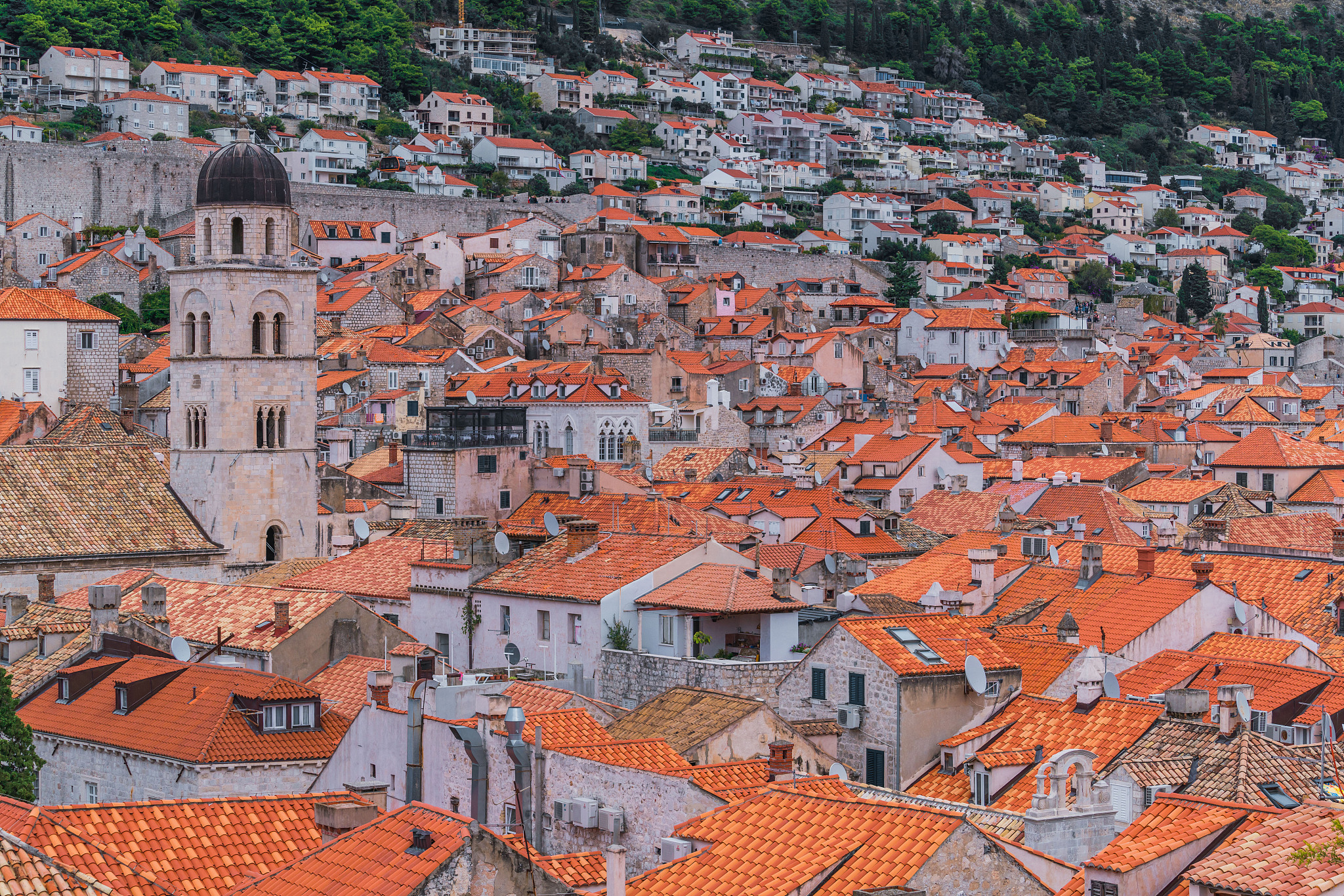 view of dubrovnik old town buildings and red roofs from the city