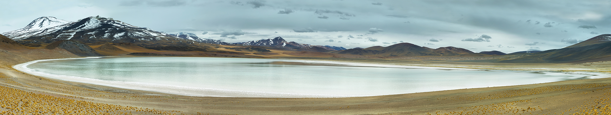 view of mountains and tuyajto lagoon in sico pass