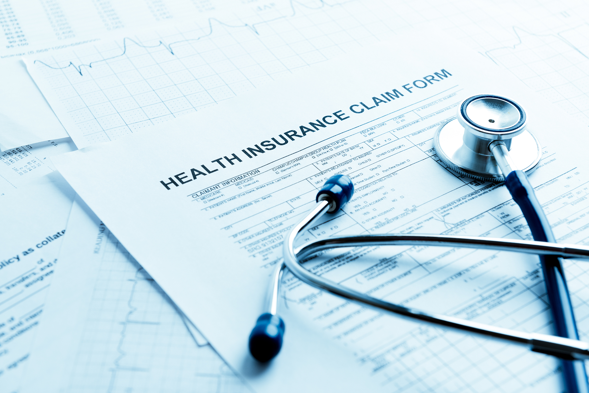health insurance form with stethoscope concept for life planning