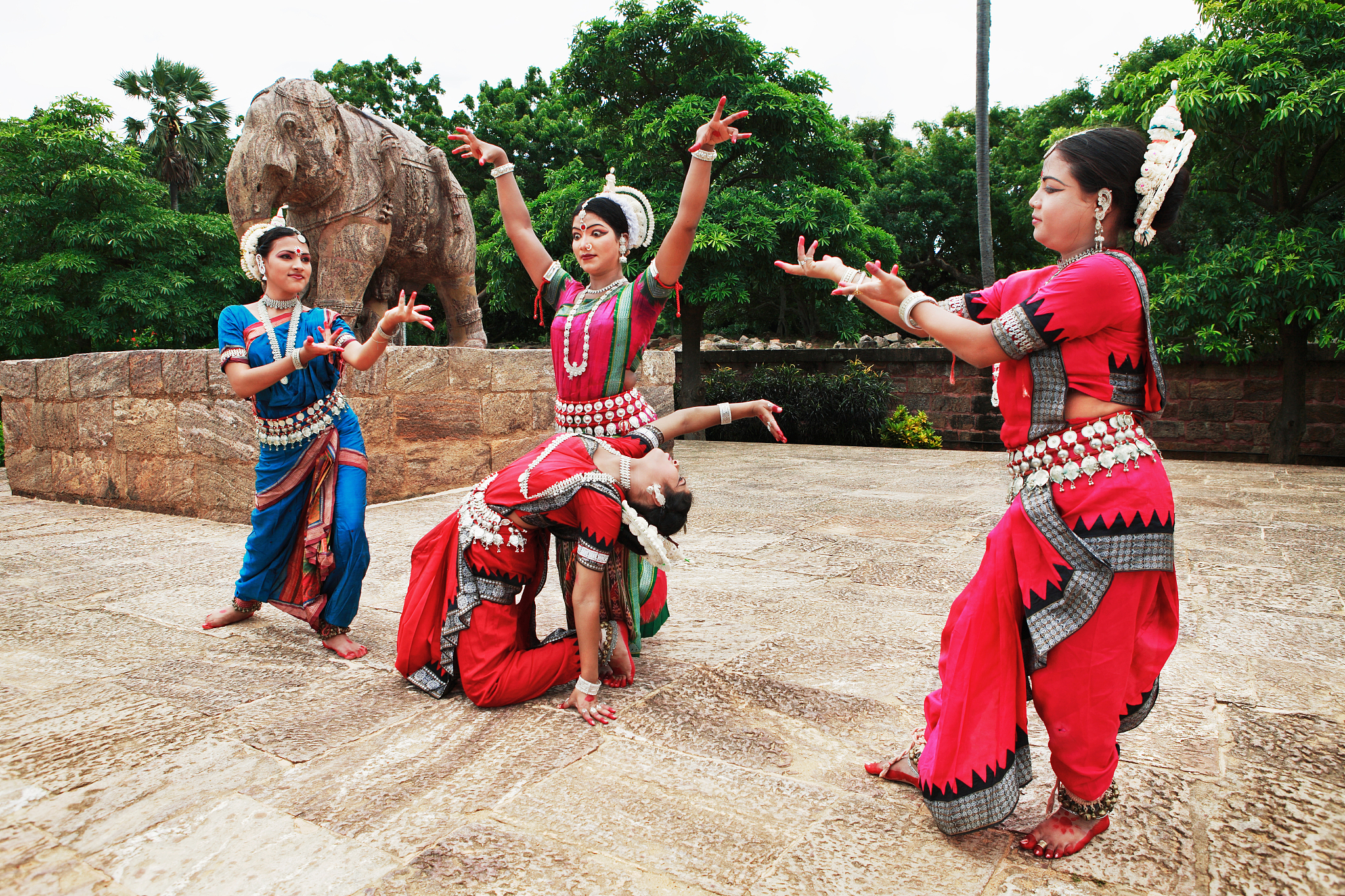 odissi dancers striking a pose