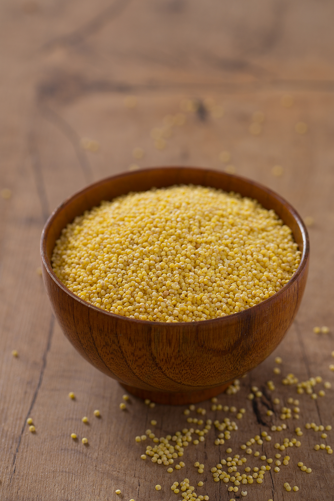 millet on wooden surface