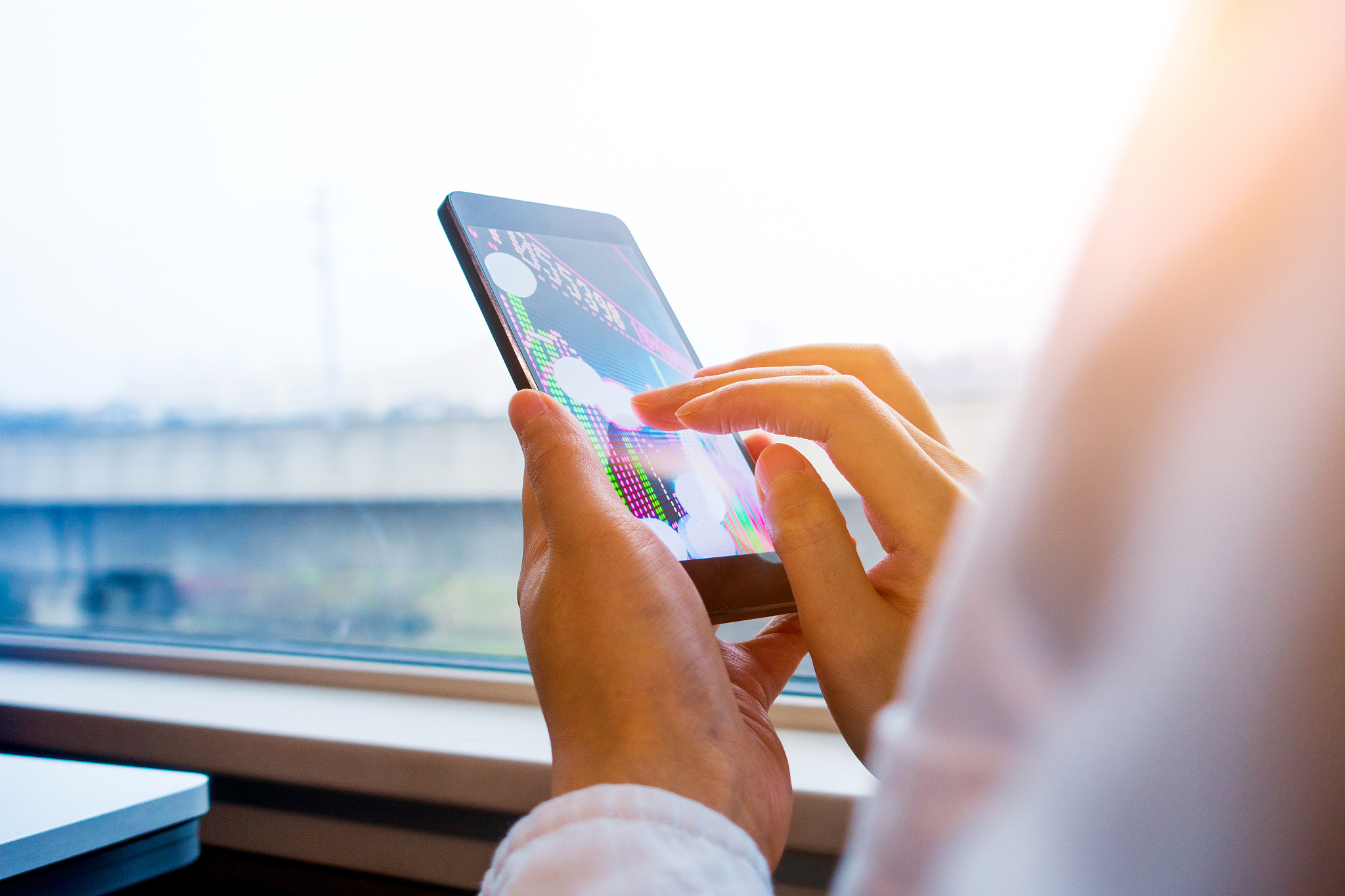 analyzing stock market on mobile phone