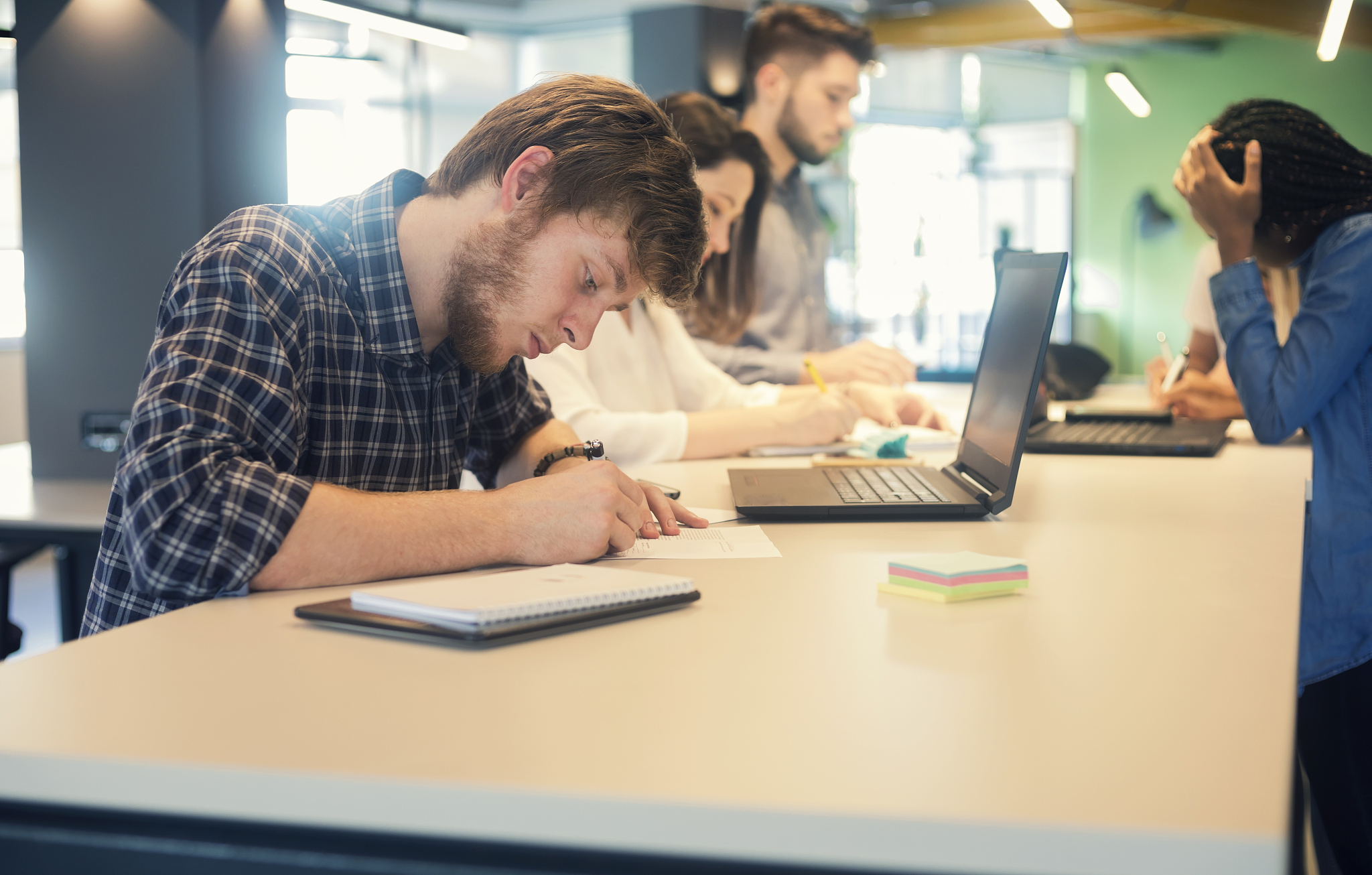young coworkers in modern office