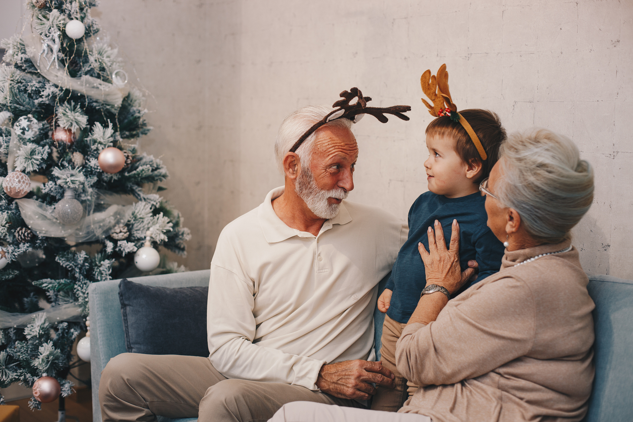 grandson having his full attention from his grandparents