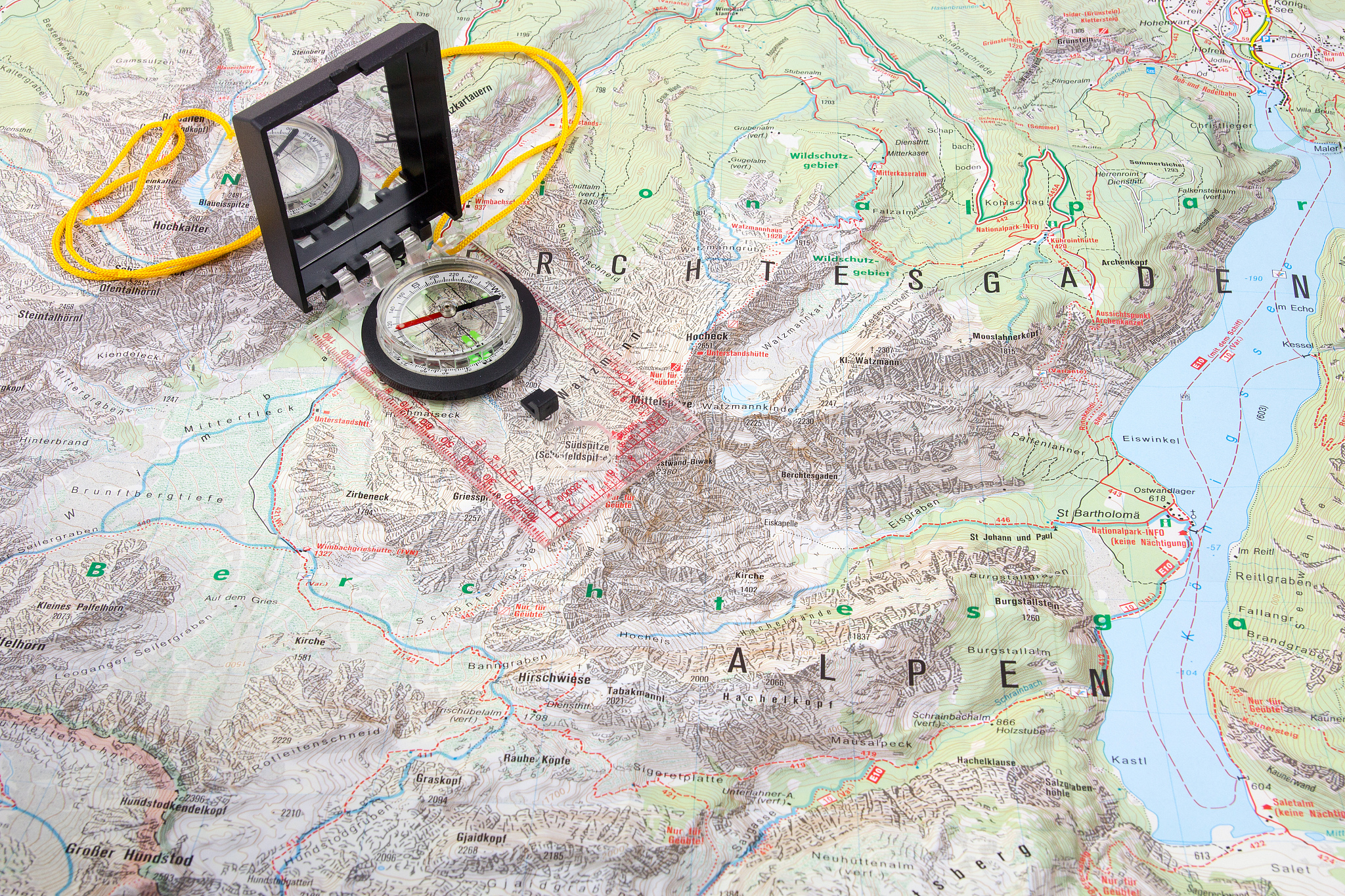 compass on a hiking map of the berchtesgaden alps