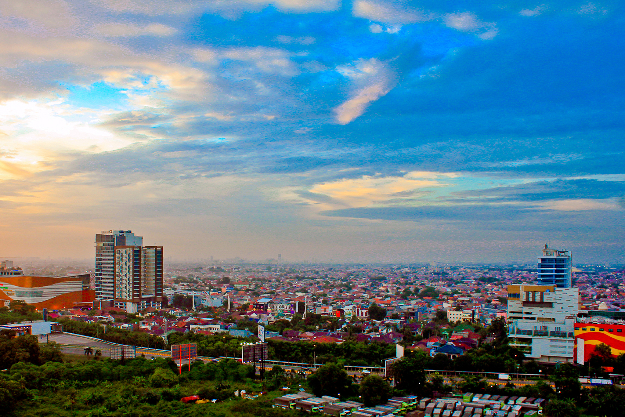 high angle view of buildings in city against sky