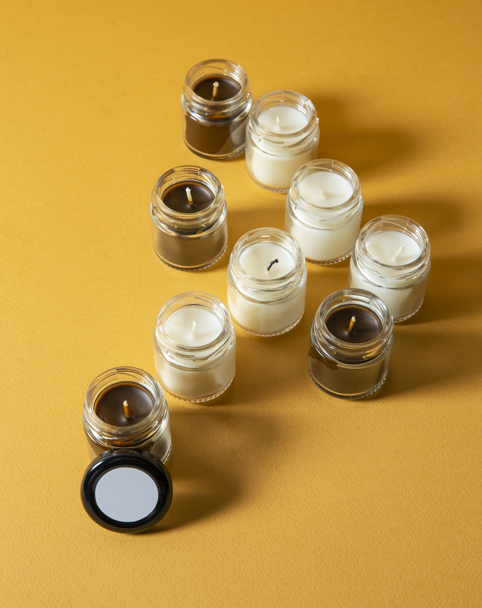 candles on yellow background