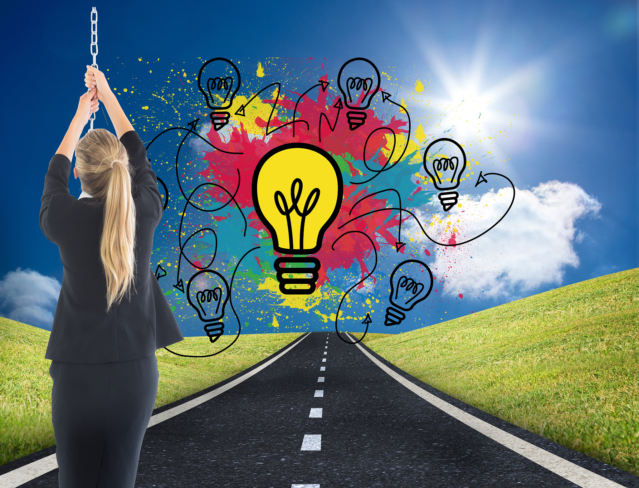 composite image of businesswoman pulling a chain