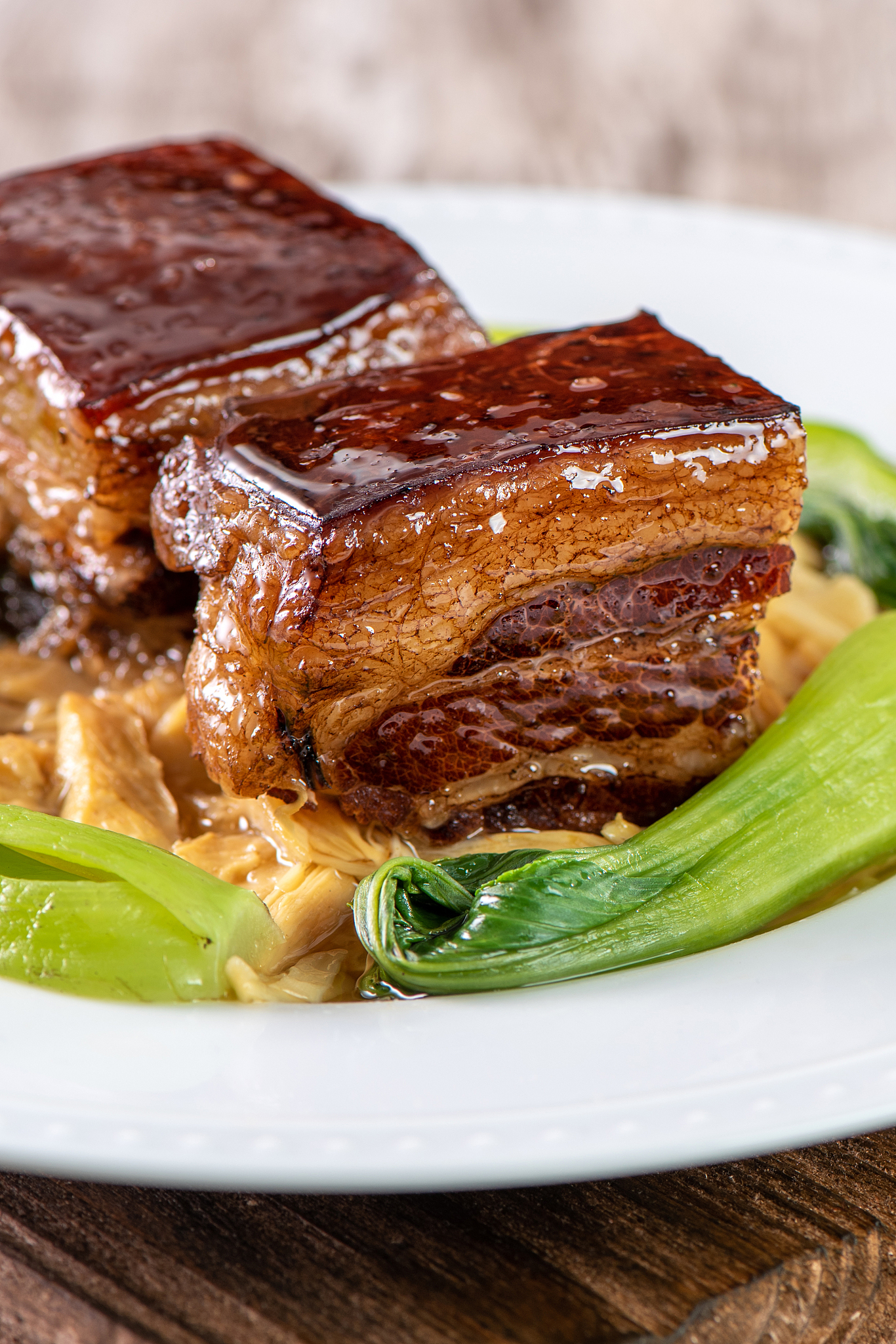 dong po rou (dongpo pork meat) in a plate with green vegetable, 