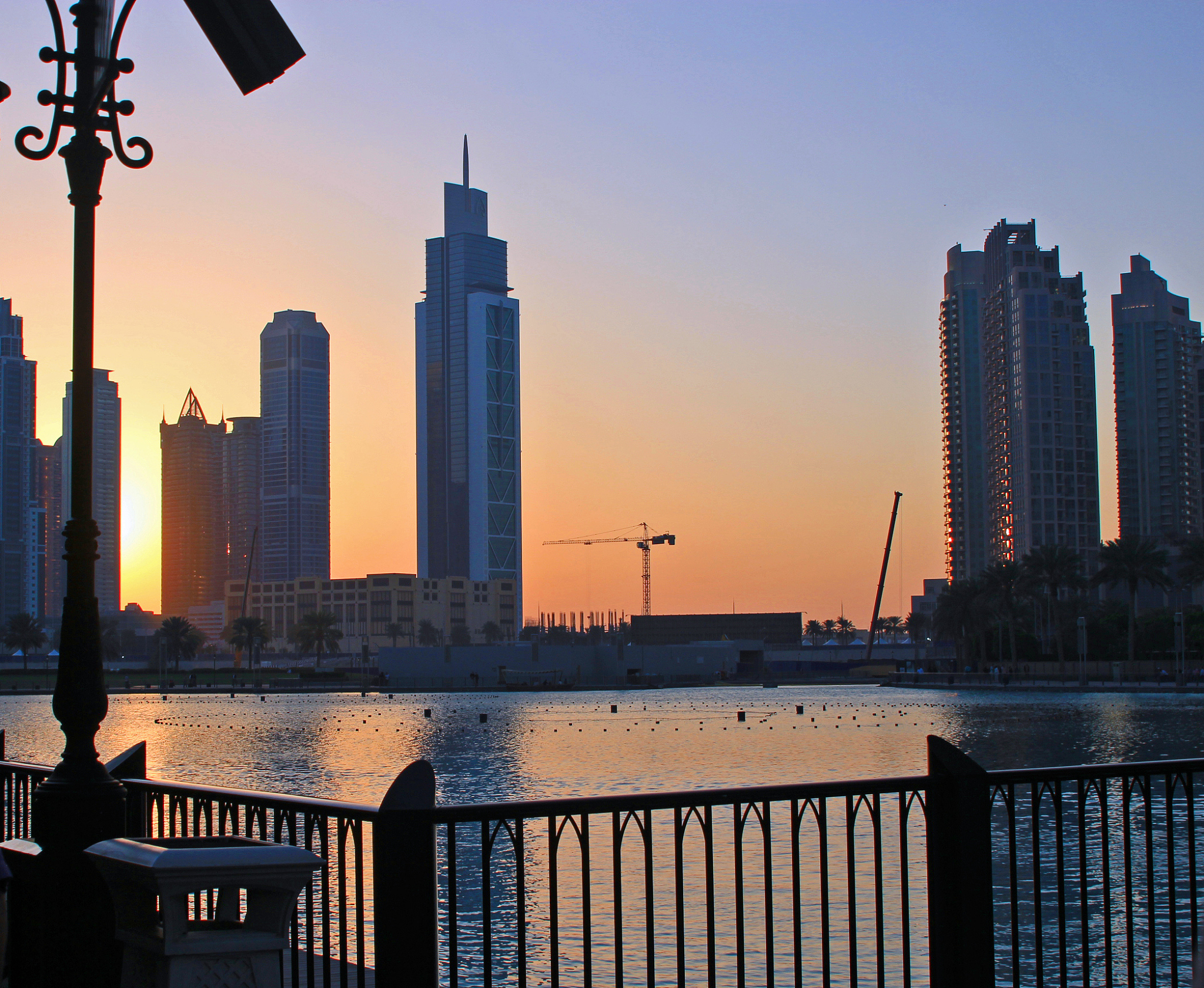 sunset through modern buildings