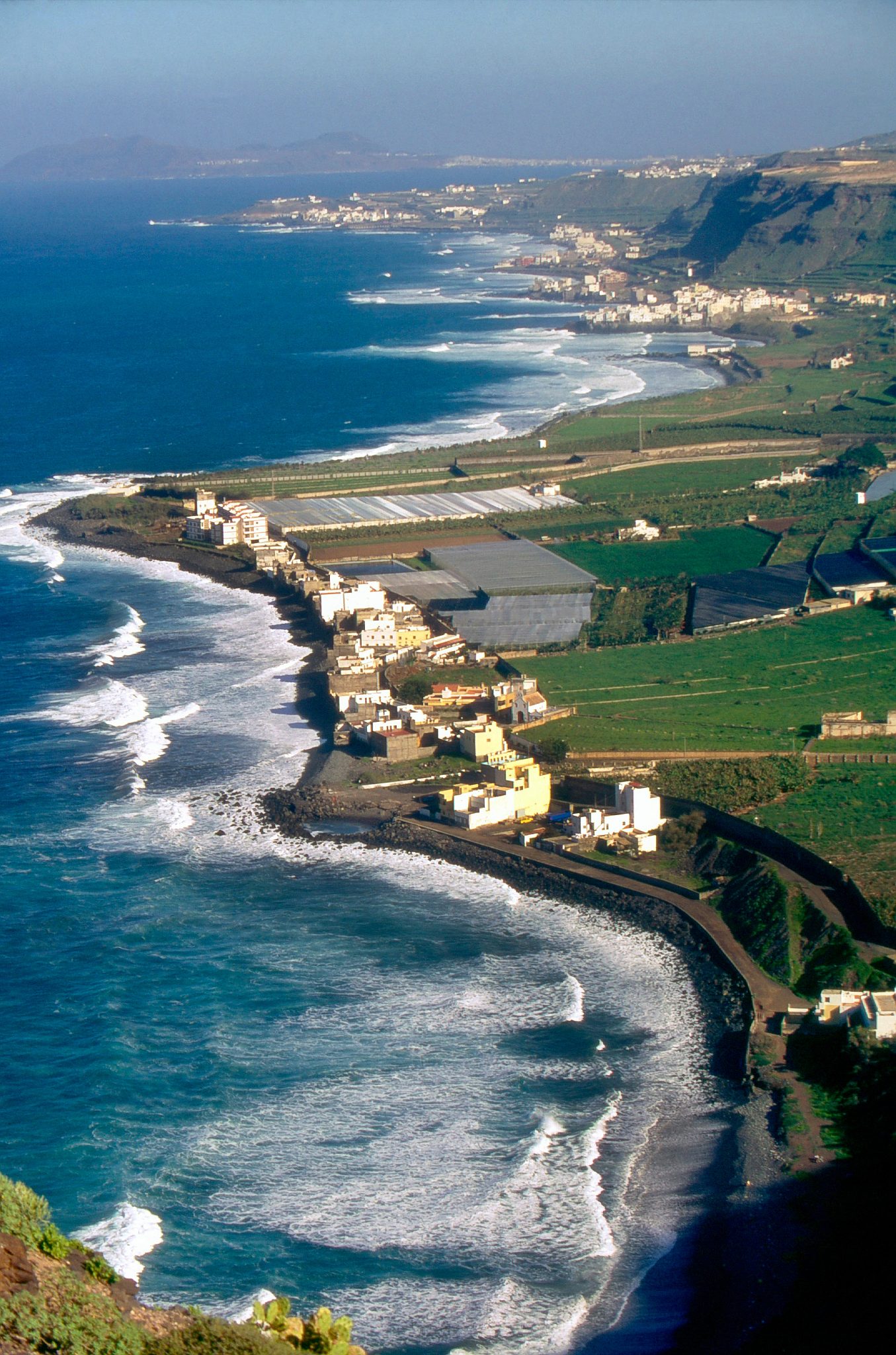 aerial view of landscape by sea