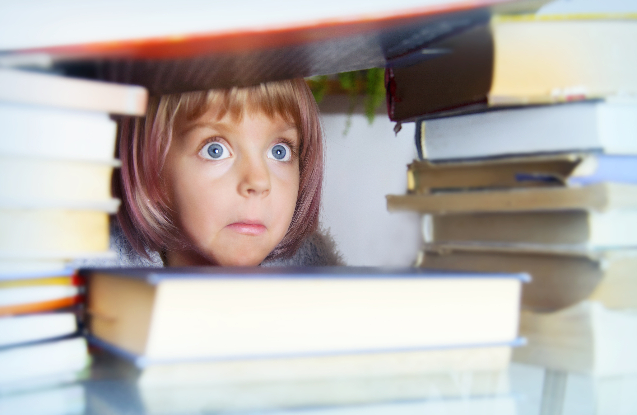 girl shocked by so many books