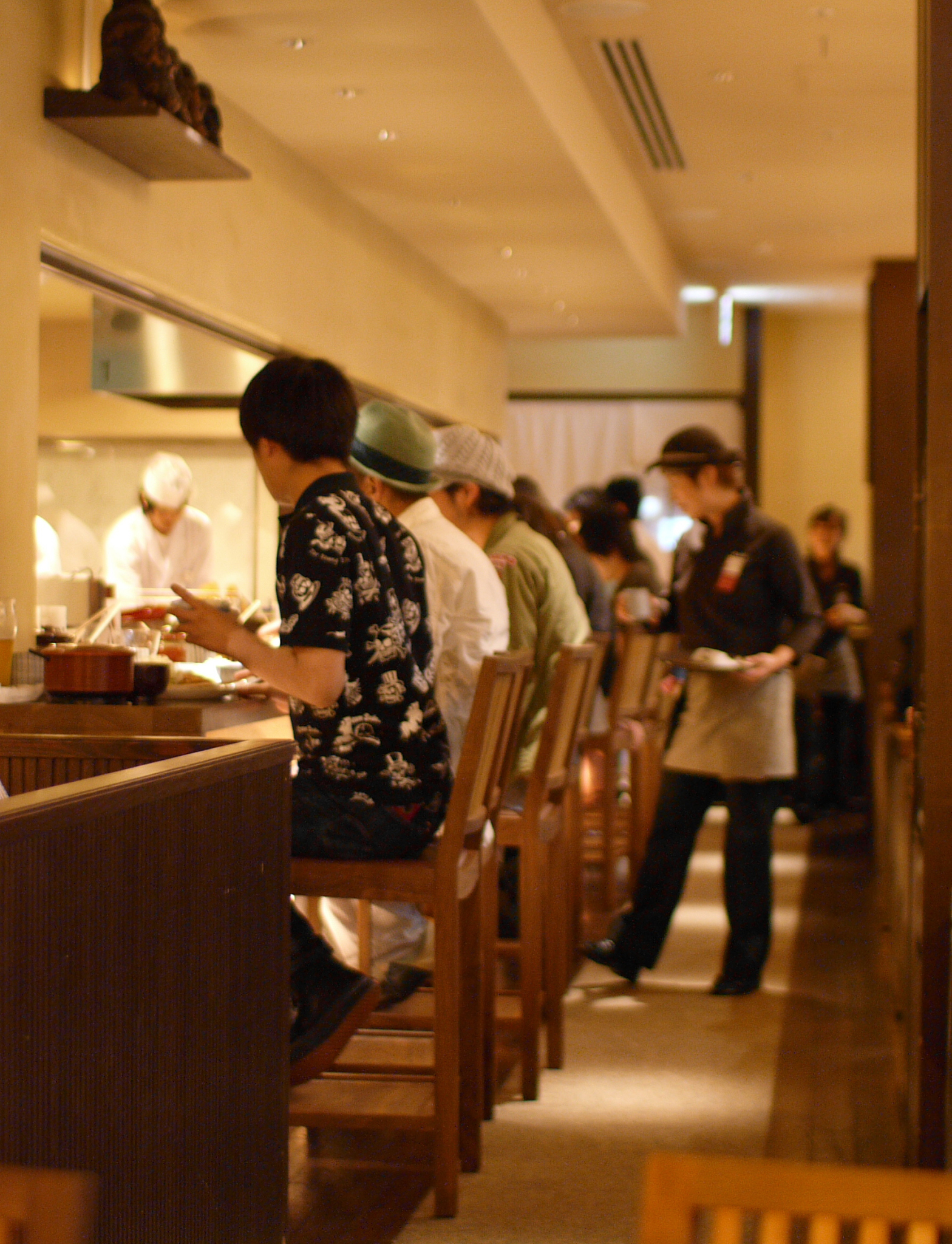 chef, customers and waitress