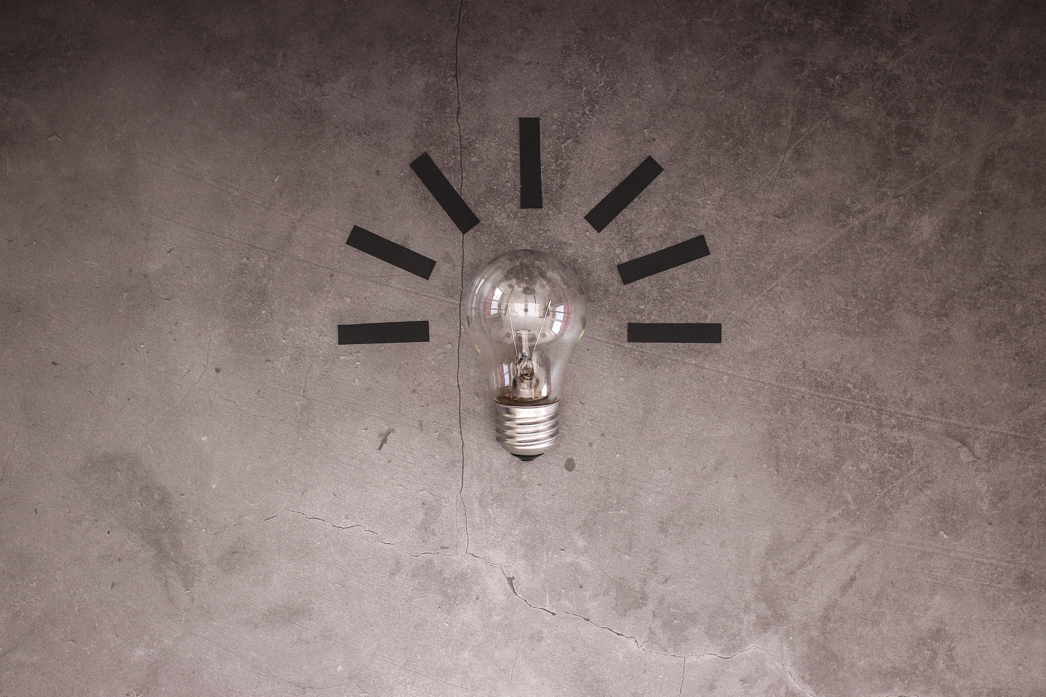 brainstorm and creative new ideas concept with light bulb