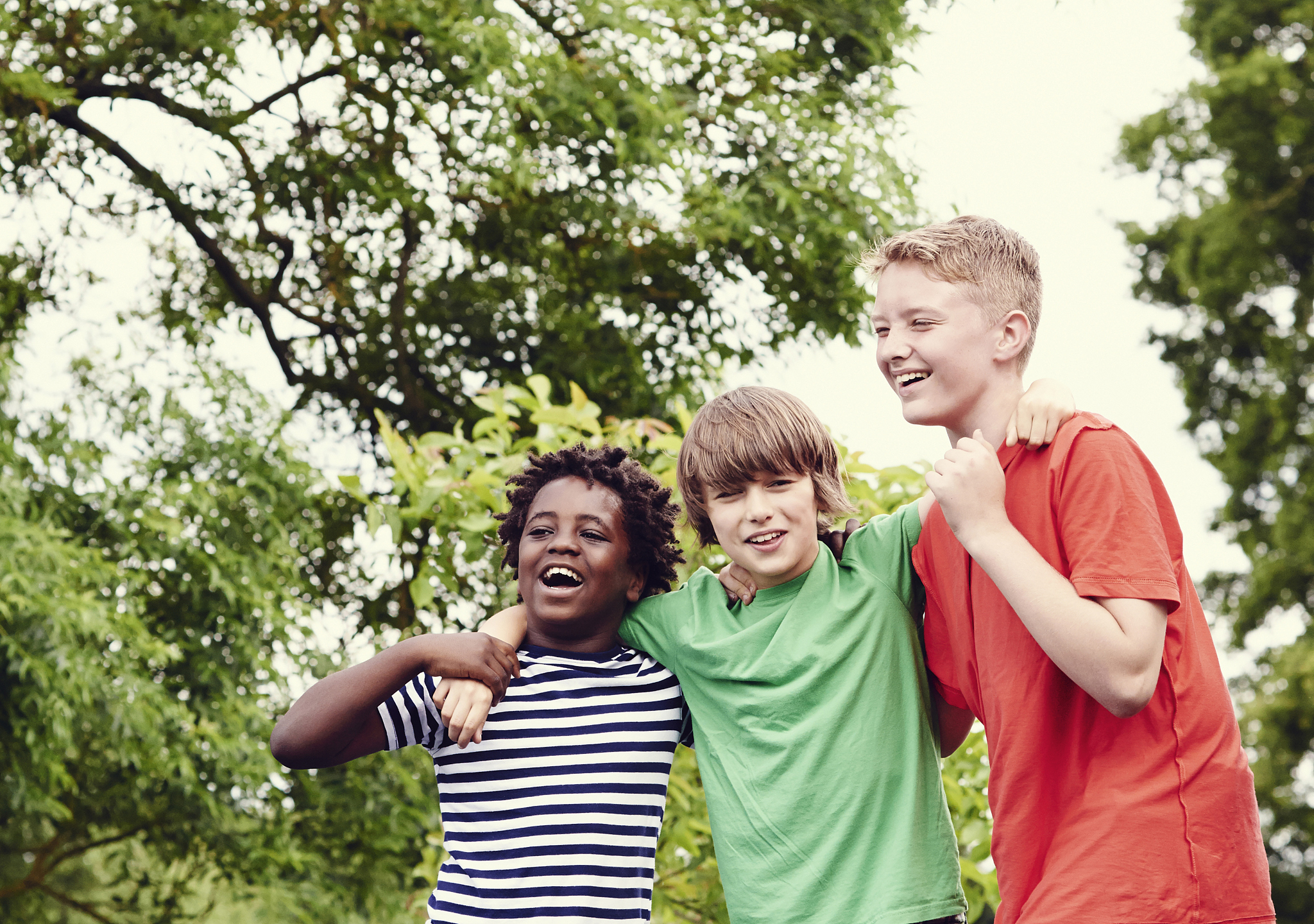 portrait of three boys laughing
