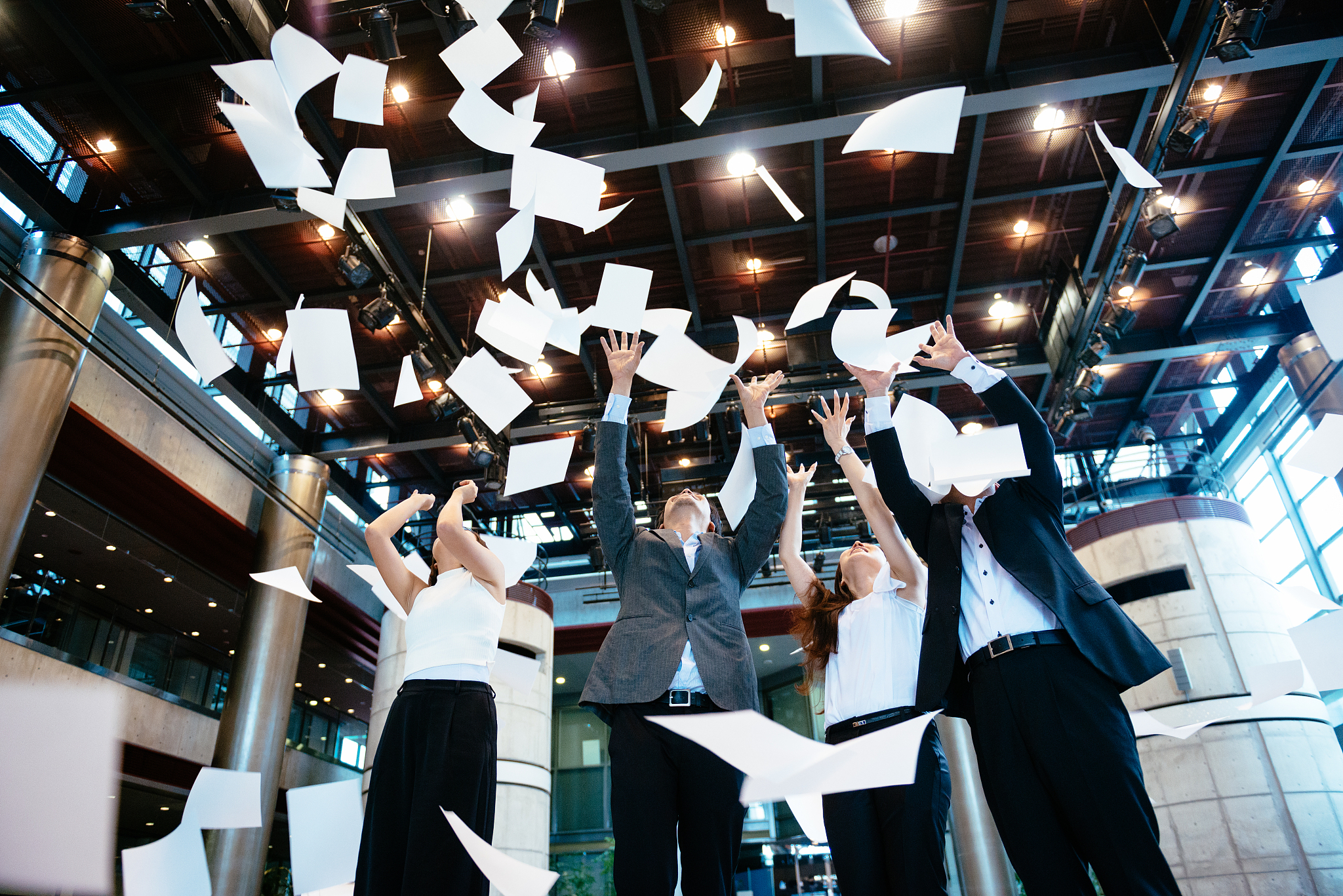 management in global corporation celebrating success
