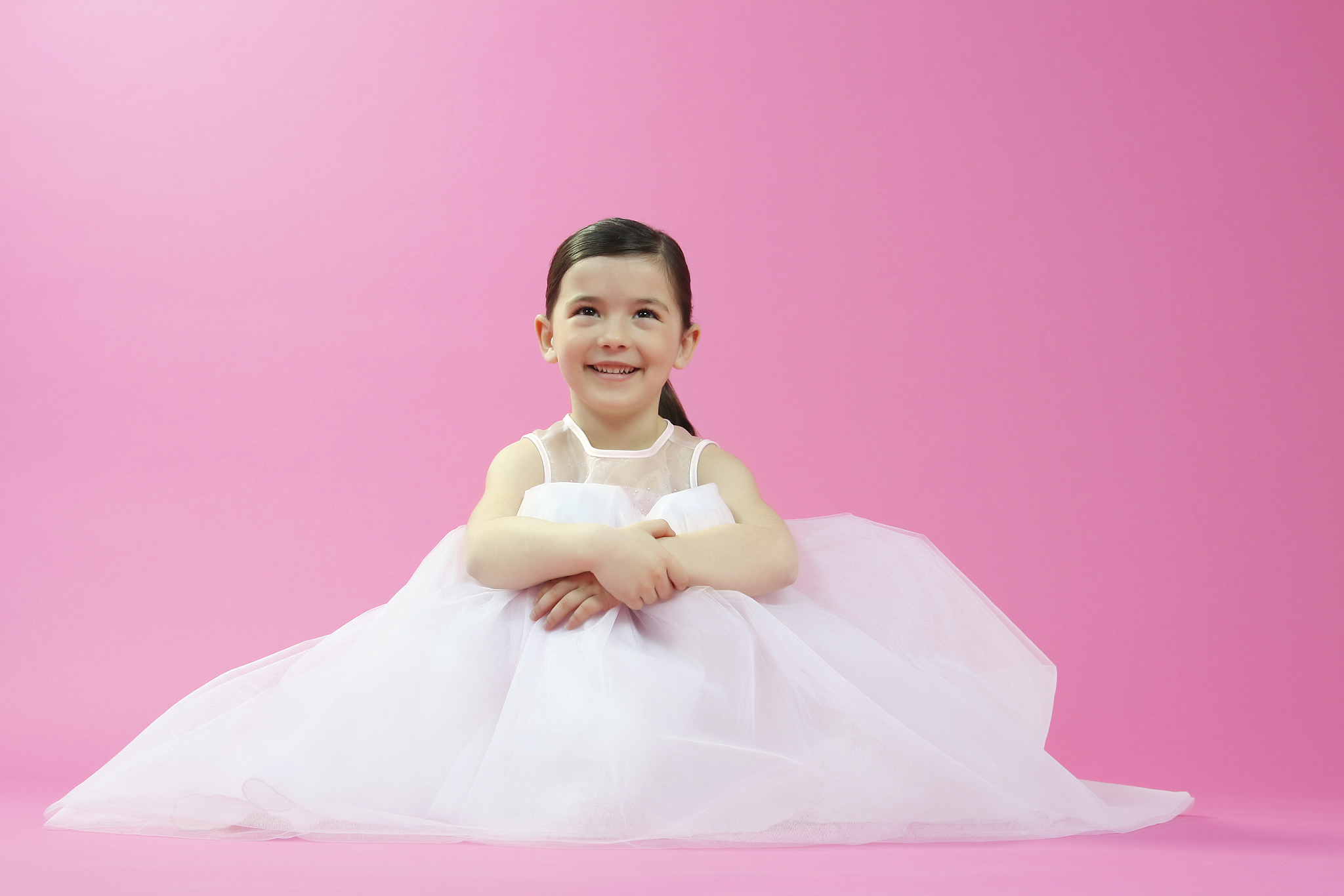little ballet dancer on a pink background