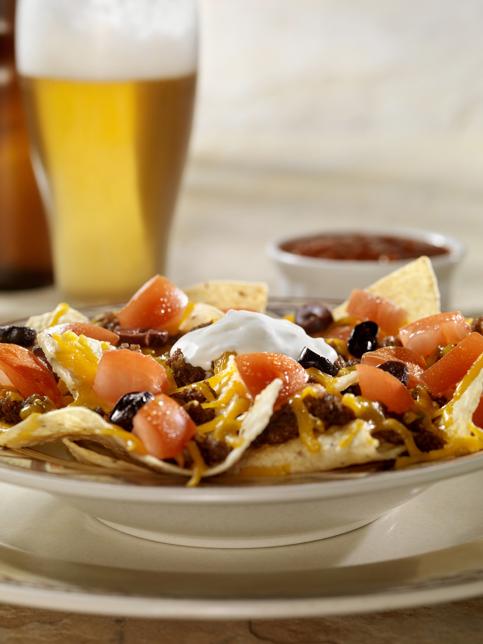 loaded nachos and a beer
