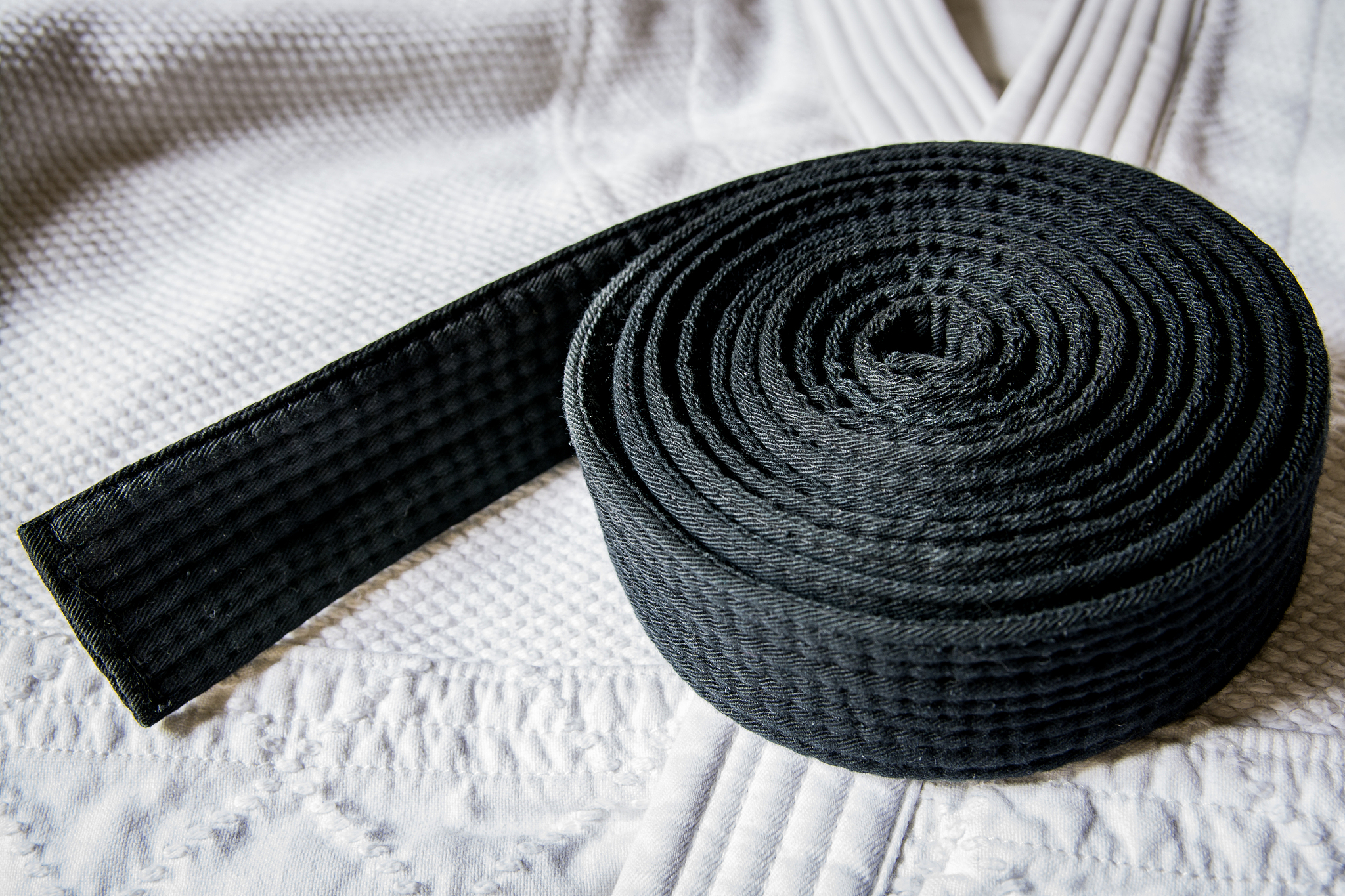 black belt and gi