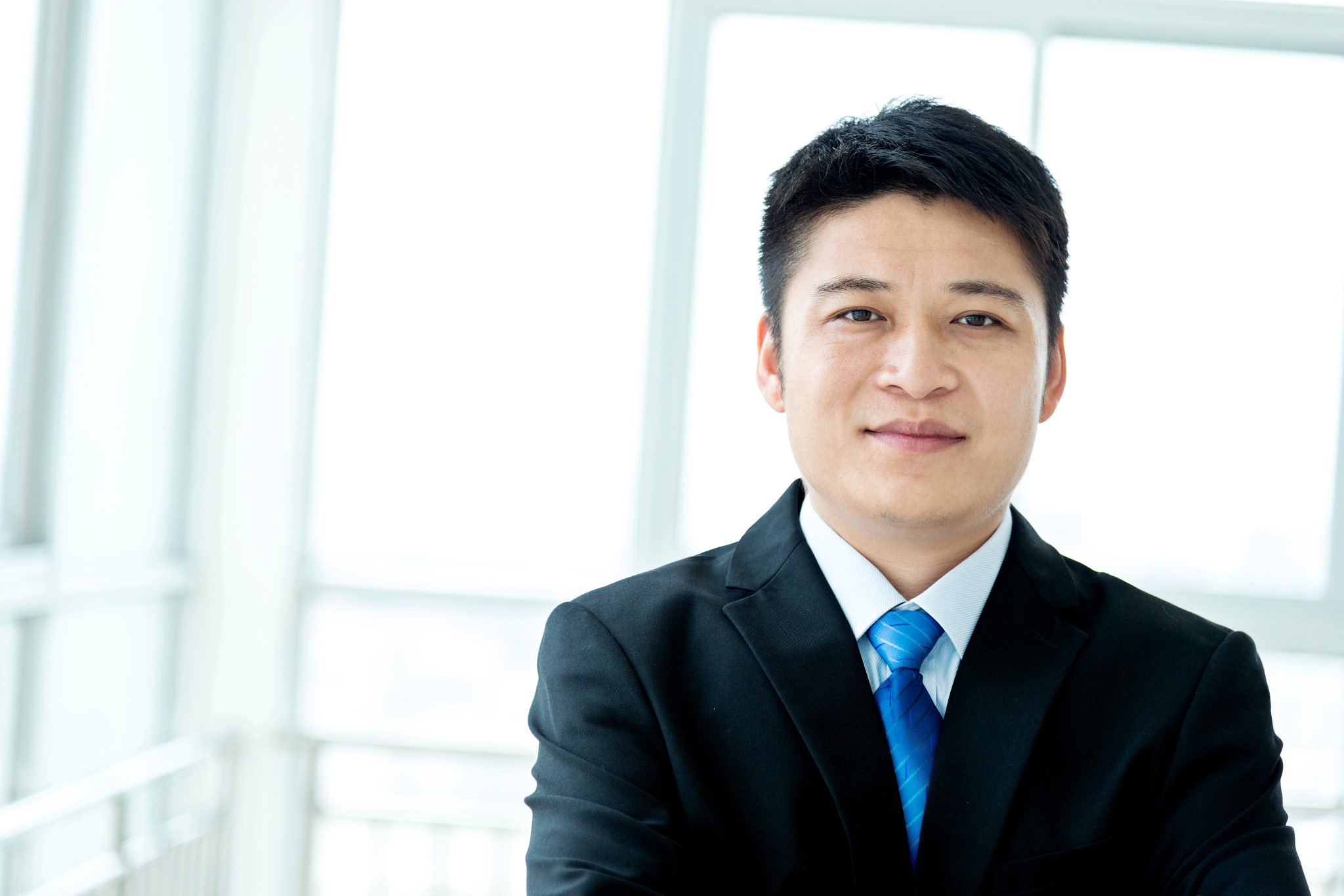 young asian businessman in office