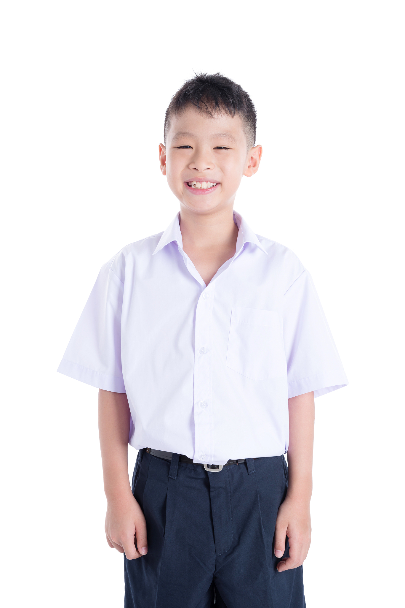 young student in uniform smiling over white