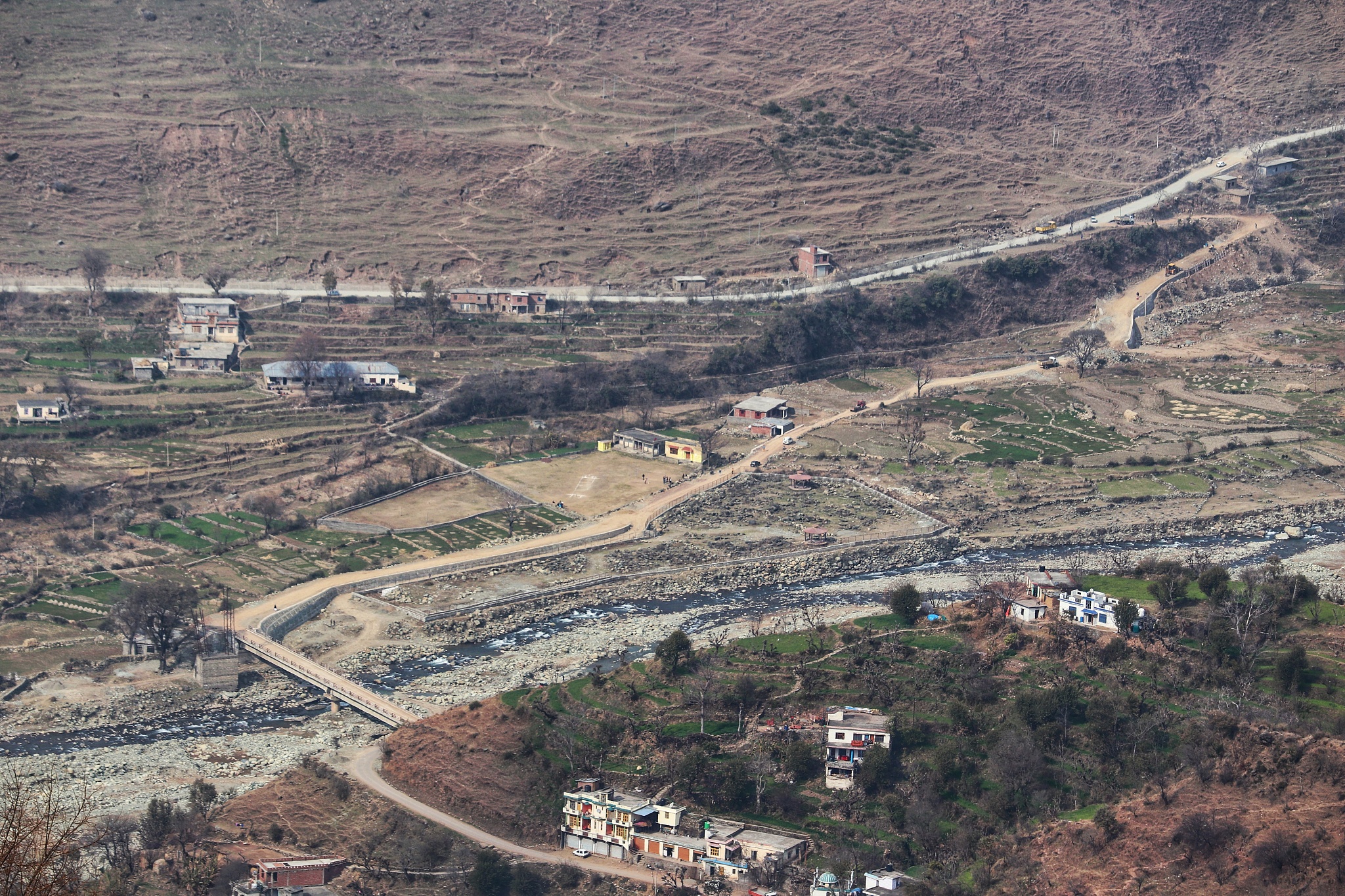 high angle view of road amidst buildings in city