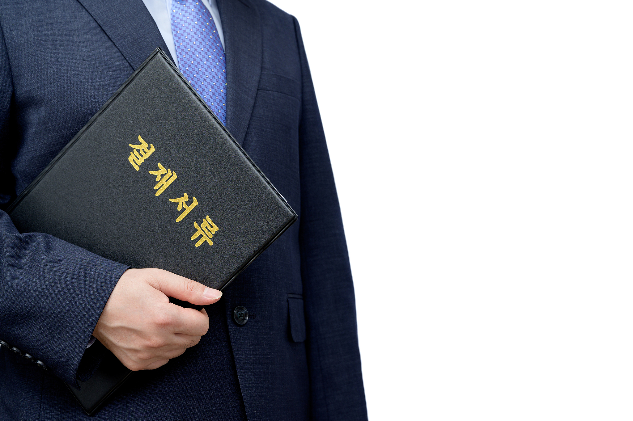 a businessman holding the file for approval.