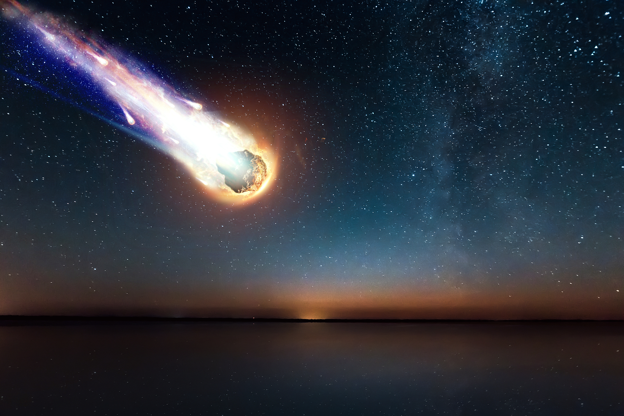 a comet, an asteroid, a meteorite falls to the ground against a 