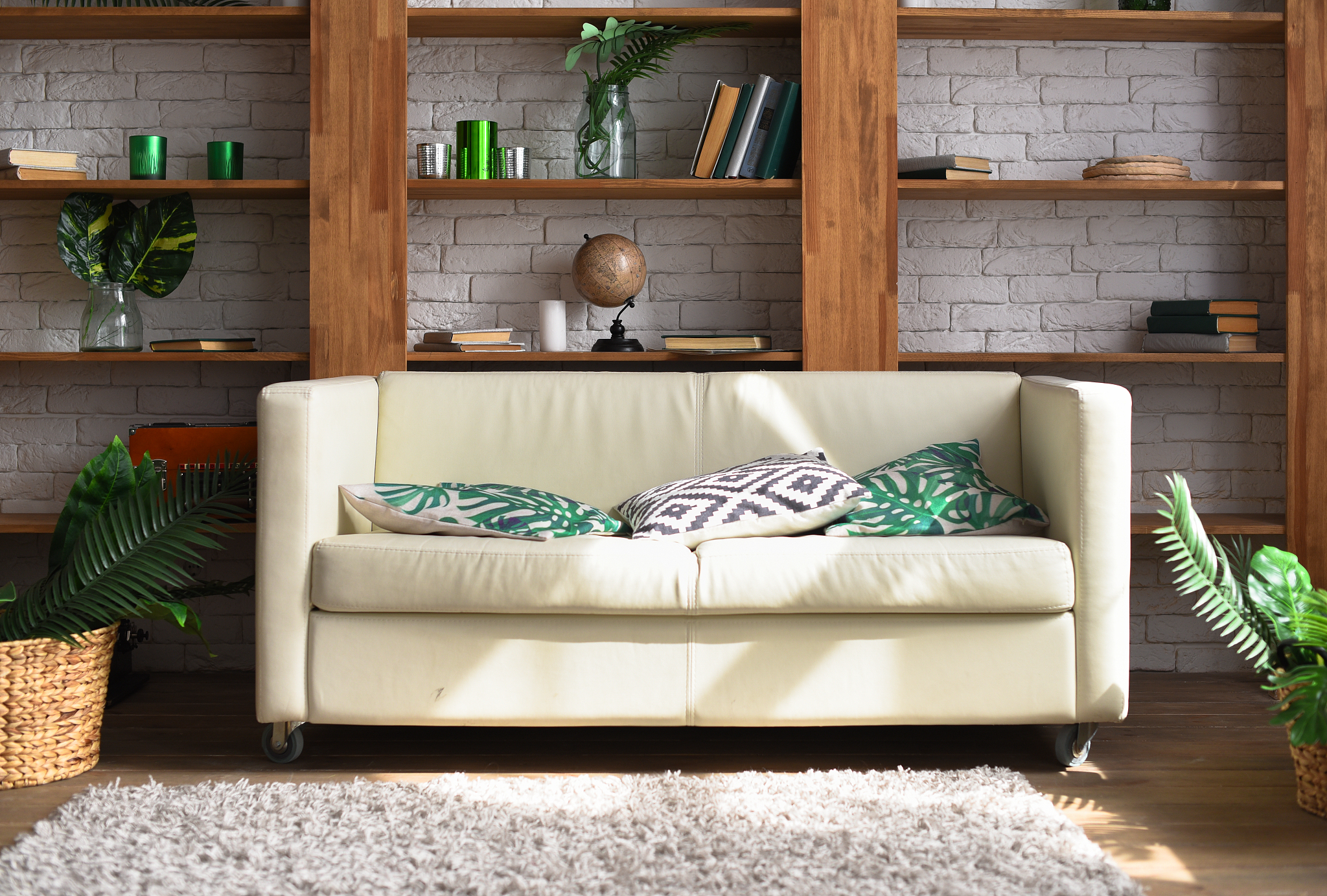 white leather sofa in a tropical style room