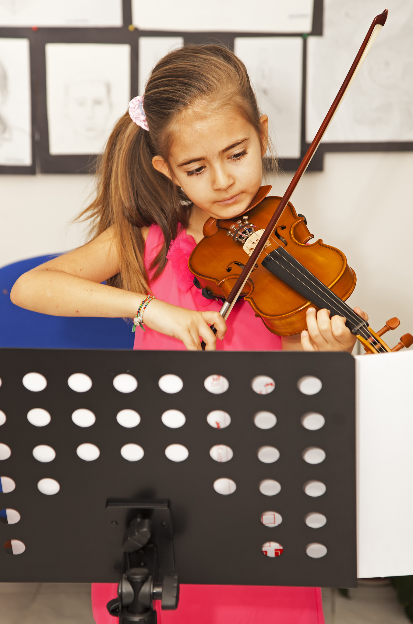 little girl playing violin