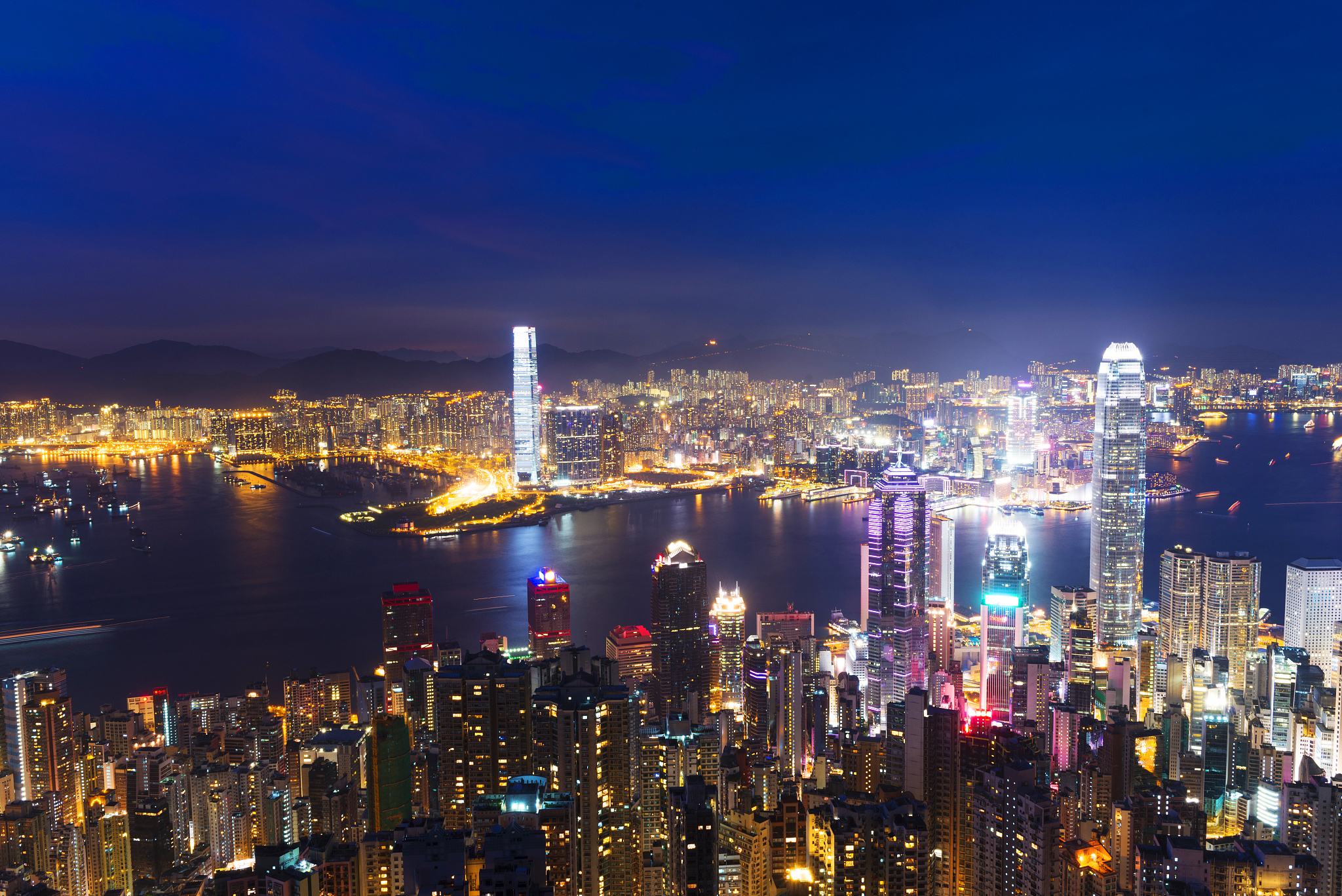cityscape and office buildings of modern city hongkong at night