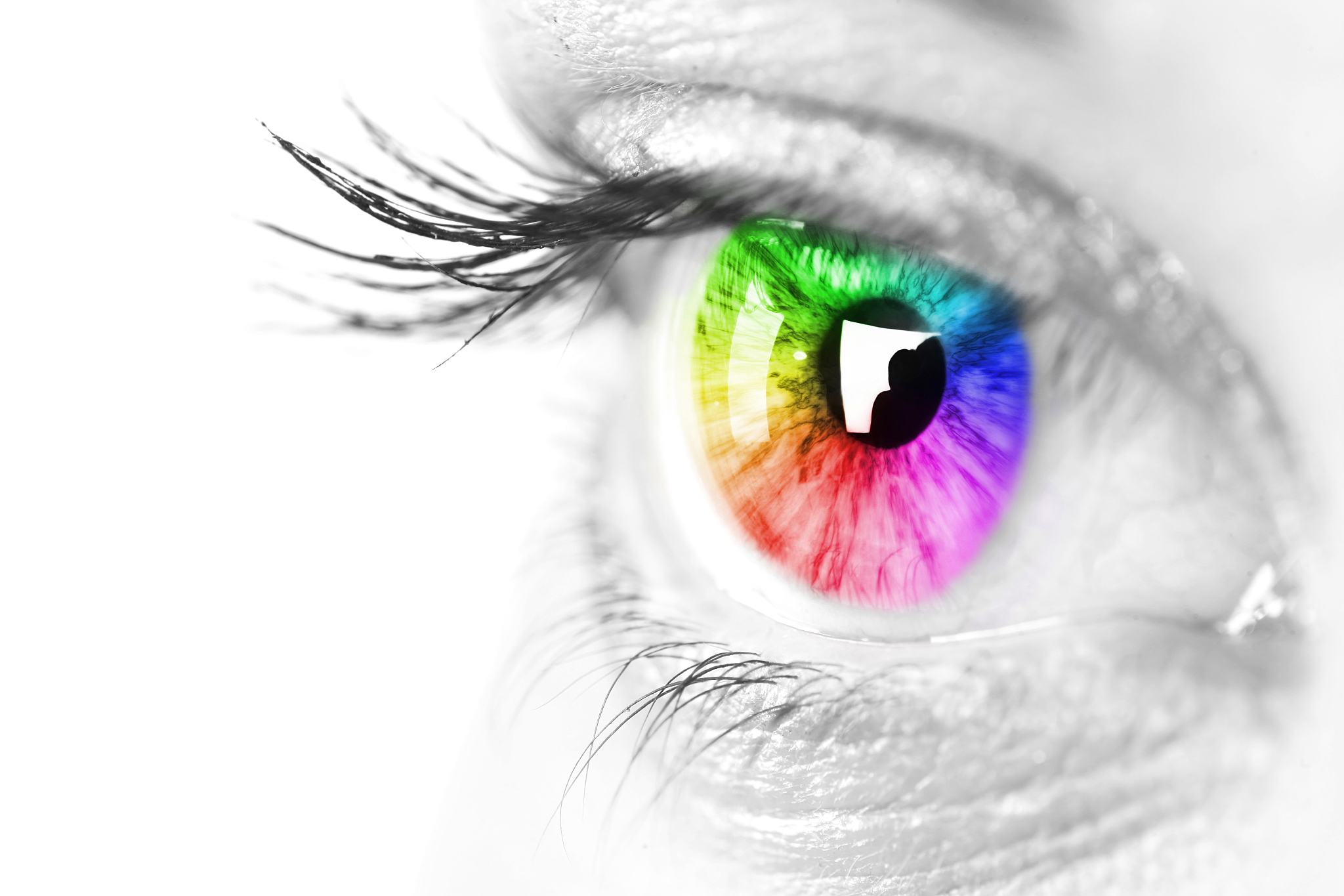 close-up image of a rainbow colored iris