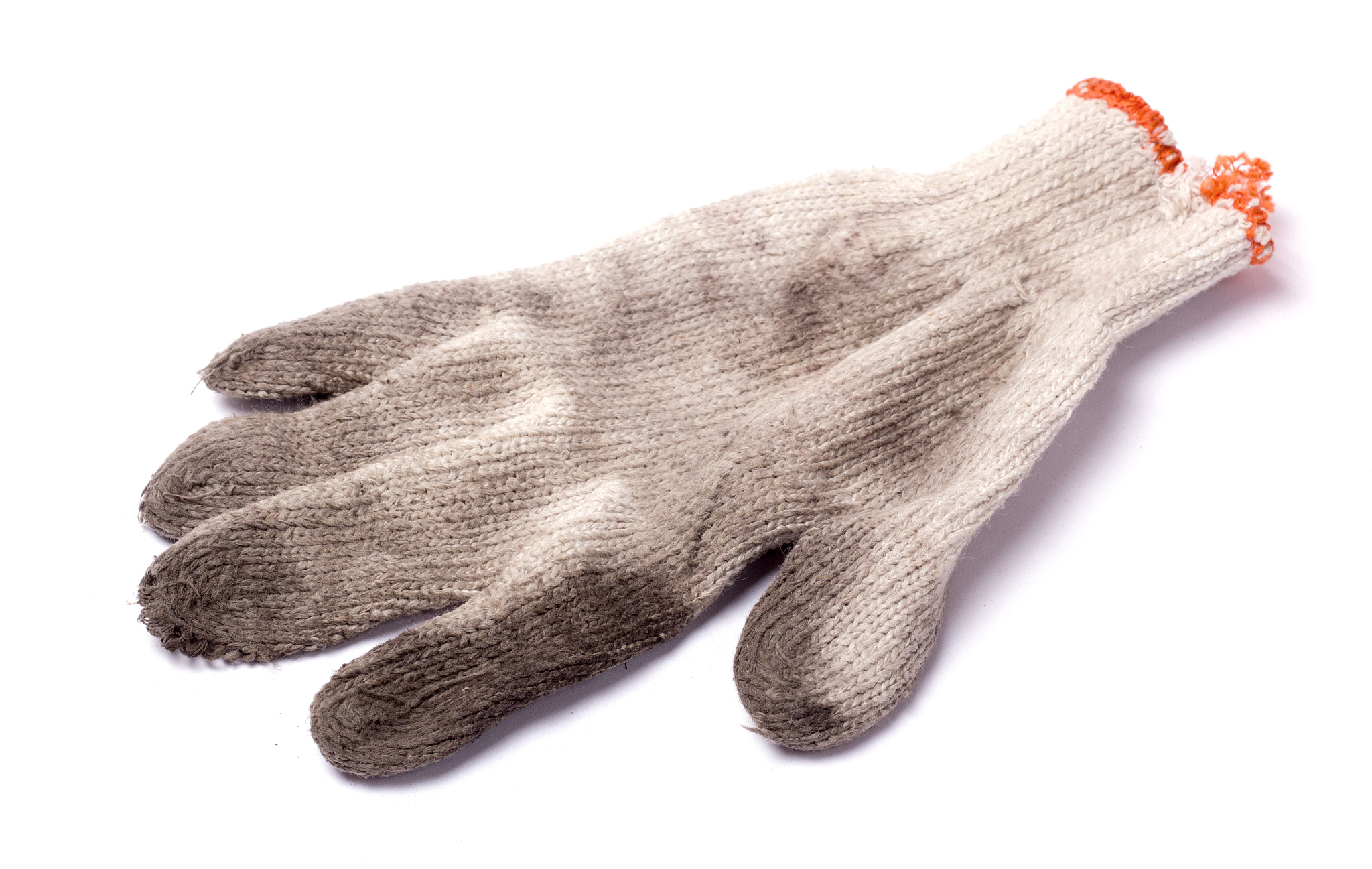 dirty gloves made of fabric isolated on white background