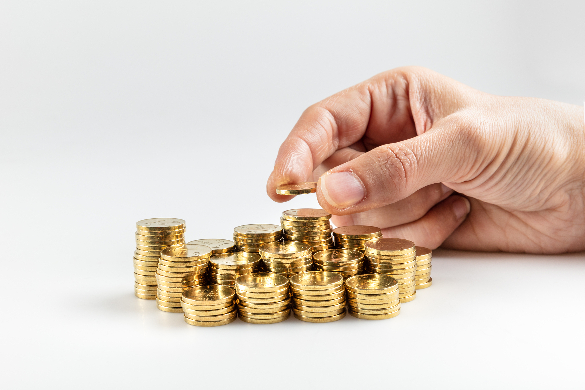 coins stacked on each other in different positions. money concep