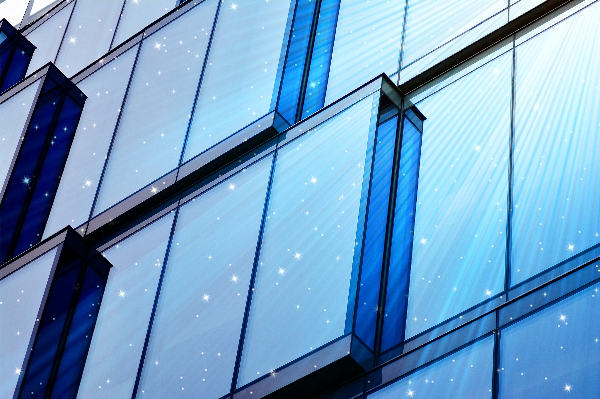 sky with the stars above a office building.