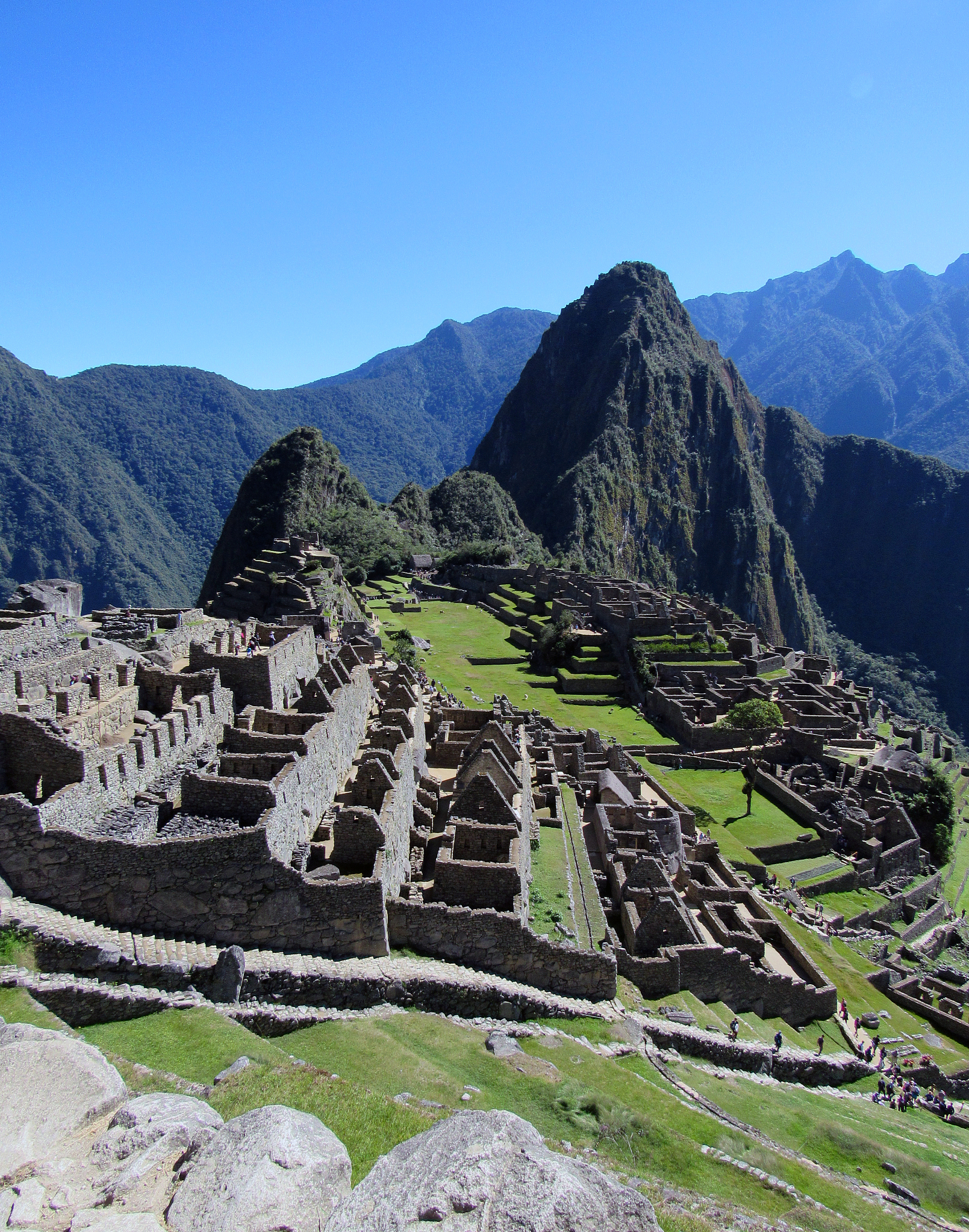 view of machu picchu ruins and huayna picchu mountain