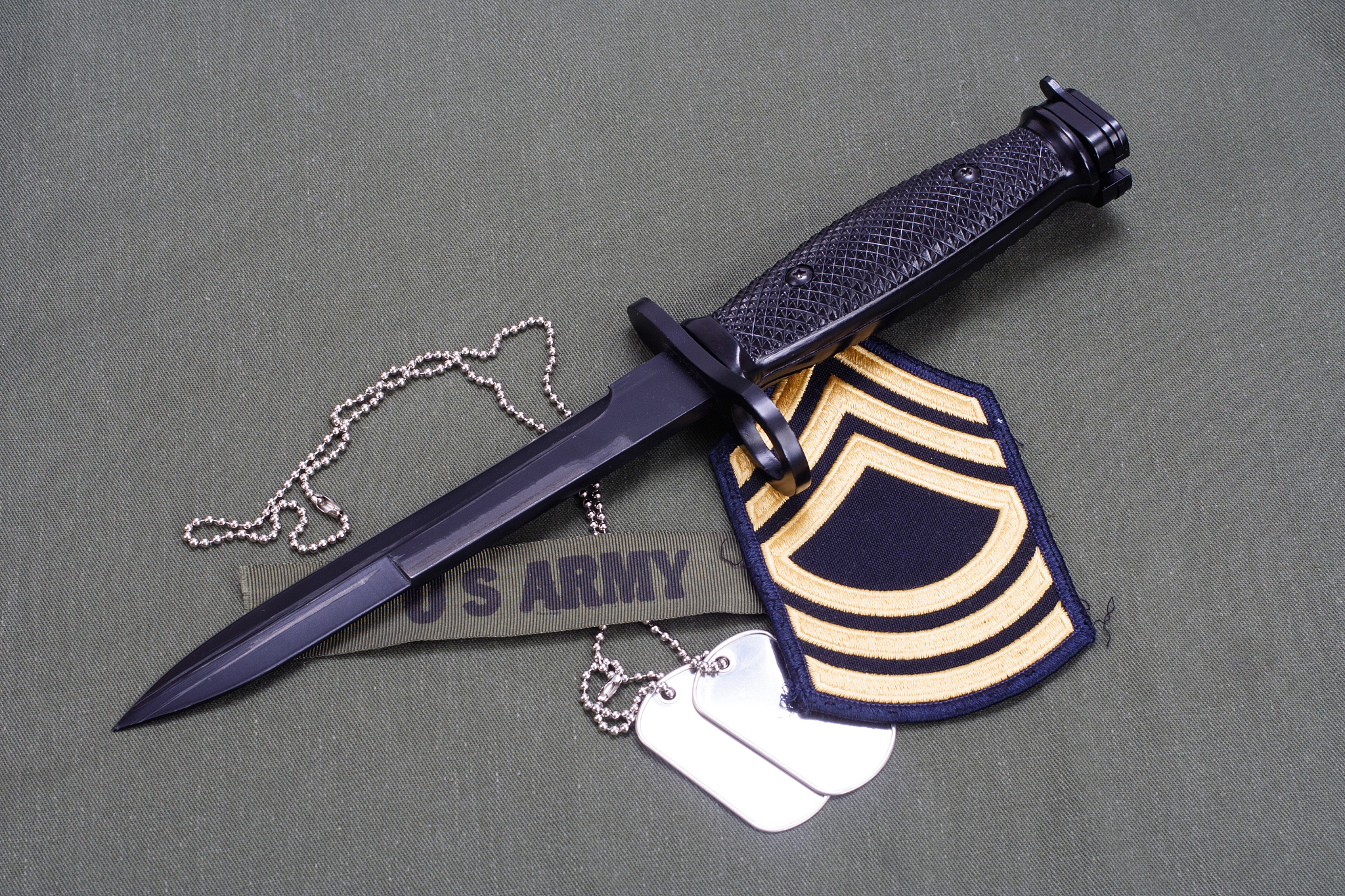bayonet on us army uniform background