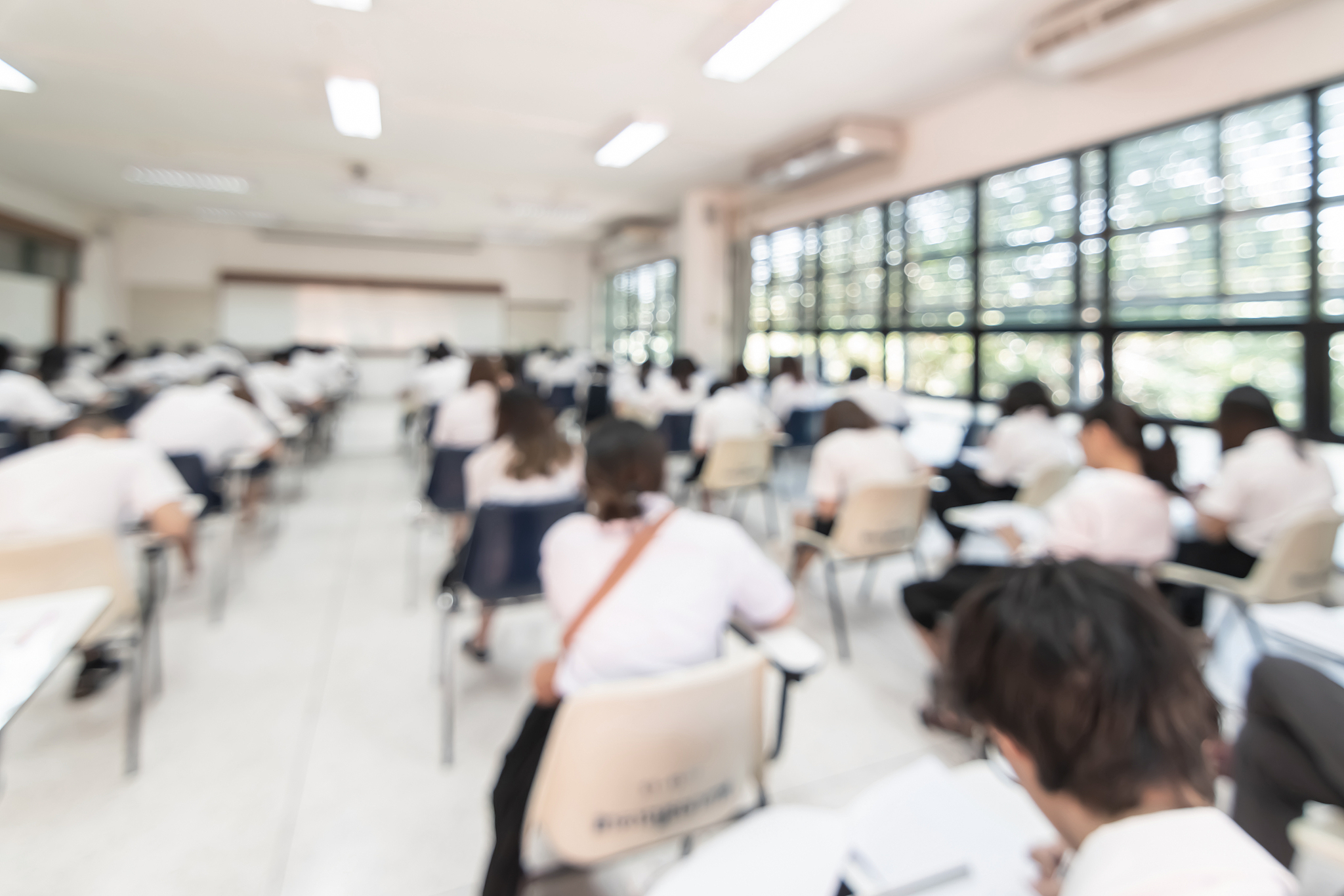 blur school student exam background  in university class with bl