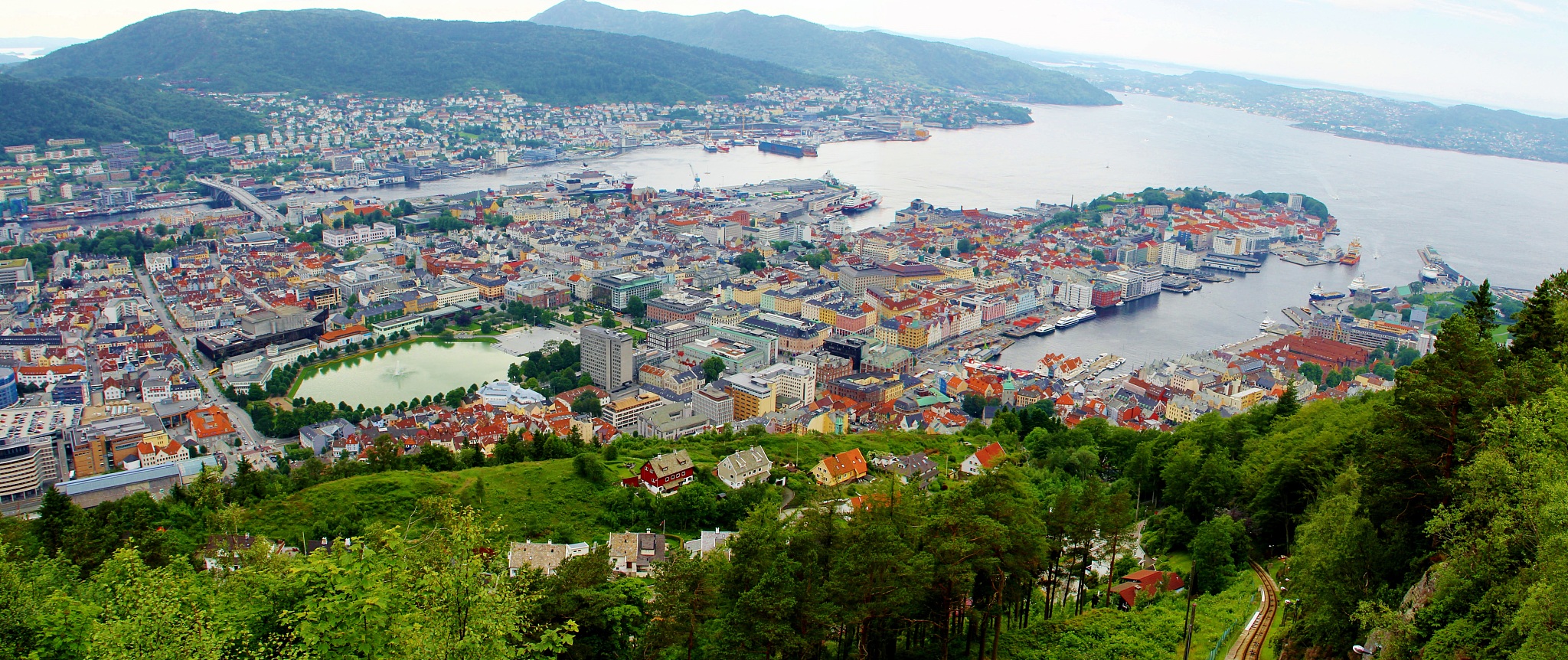 high angle view of townscape and mountains in city