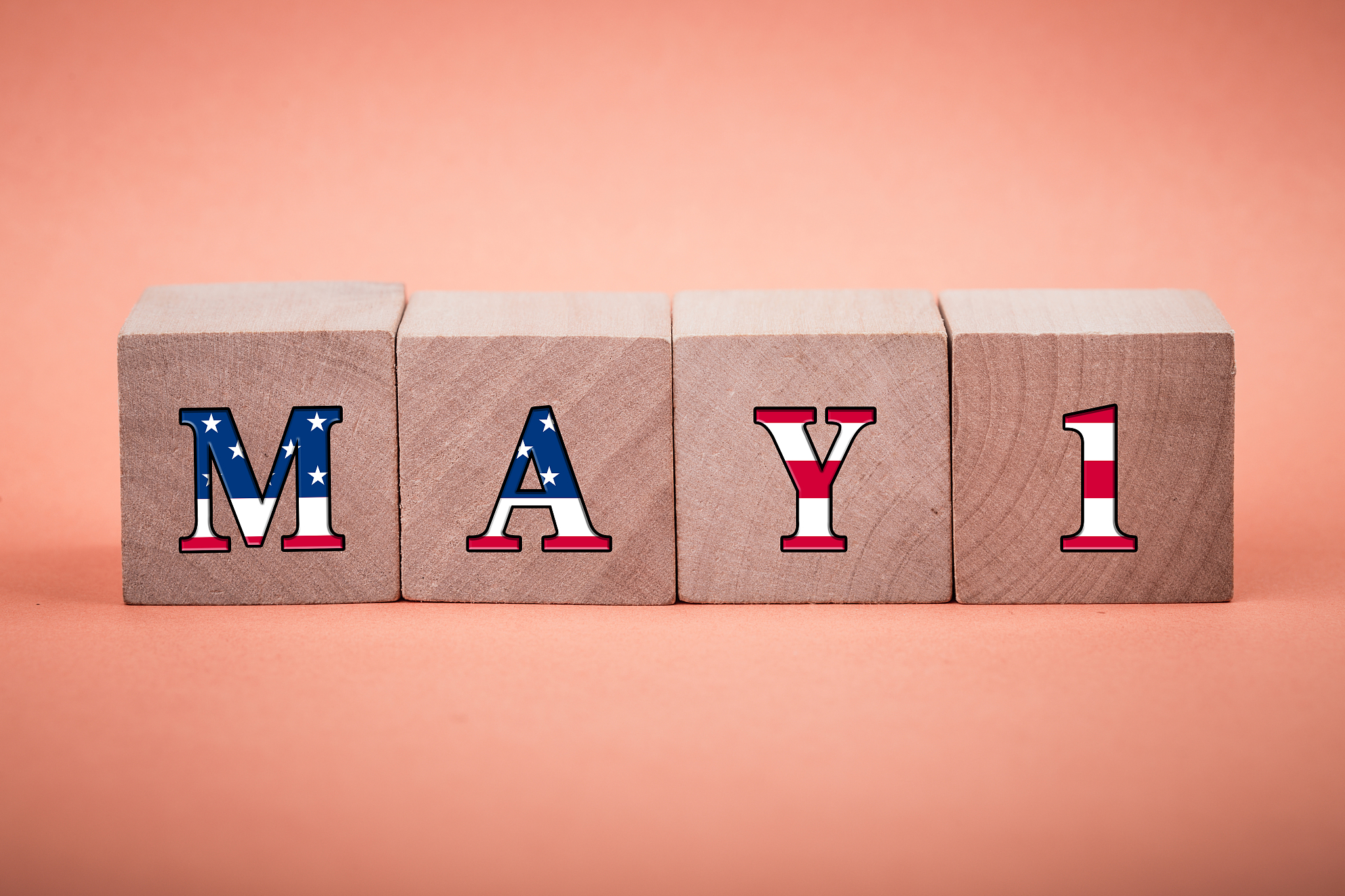 may 1 labor day concept wooden cube blocks