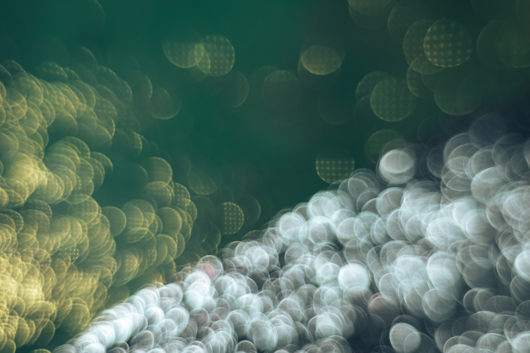 beautiful gold and silver bokeh on a green background pattern fo