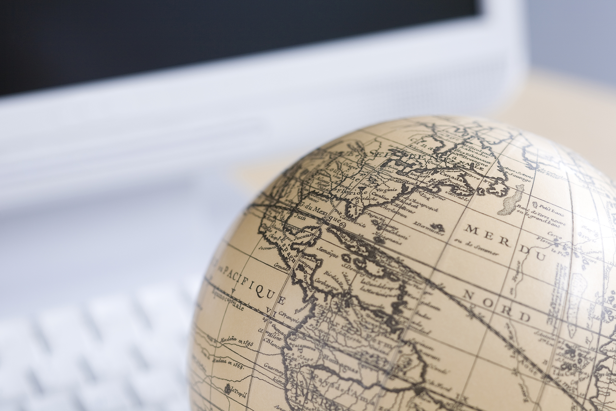 desktop pc and globe