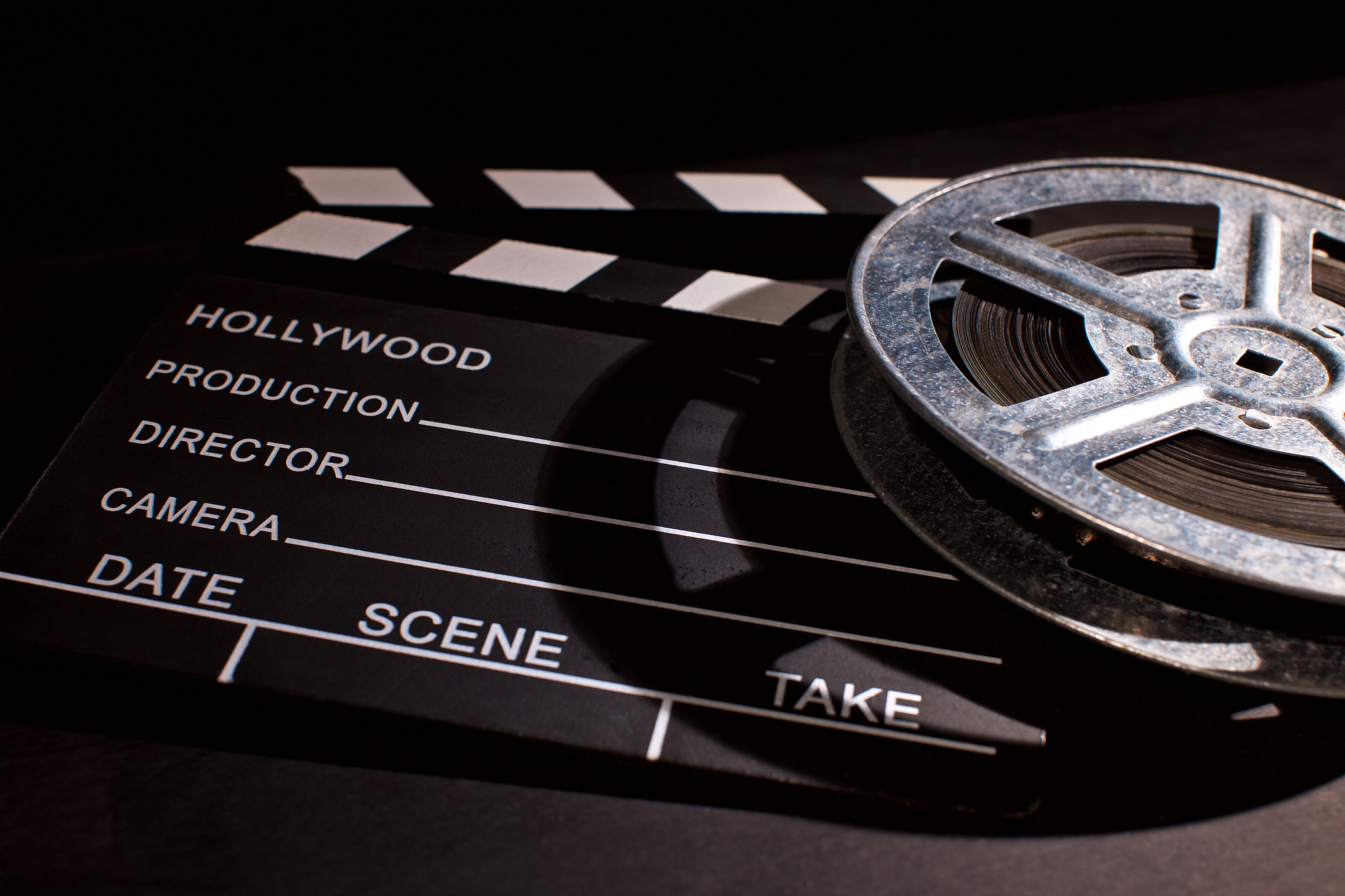 movie film reel and clapboard