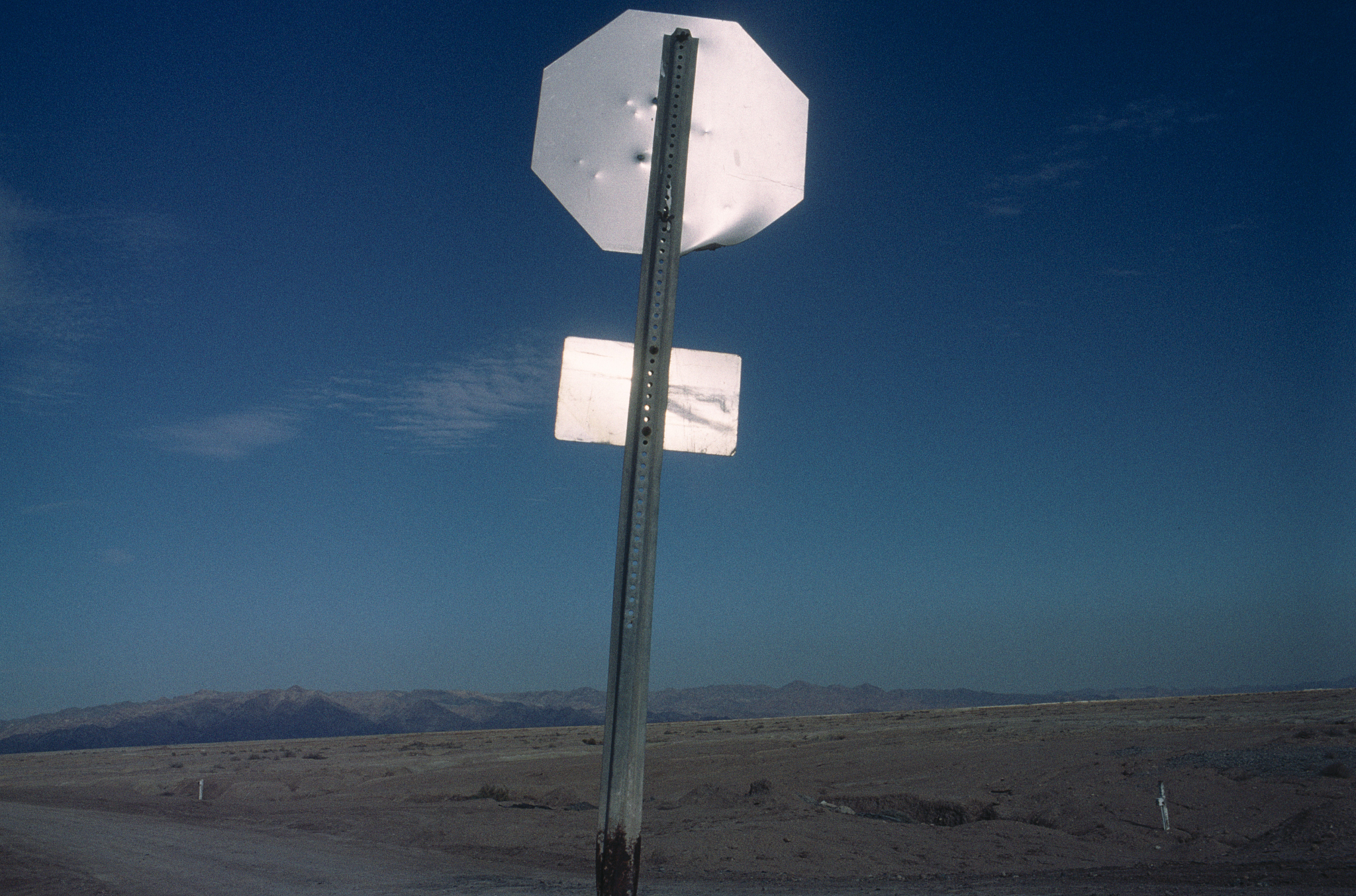 stop sign in desert