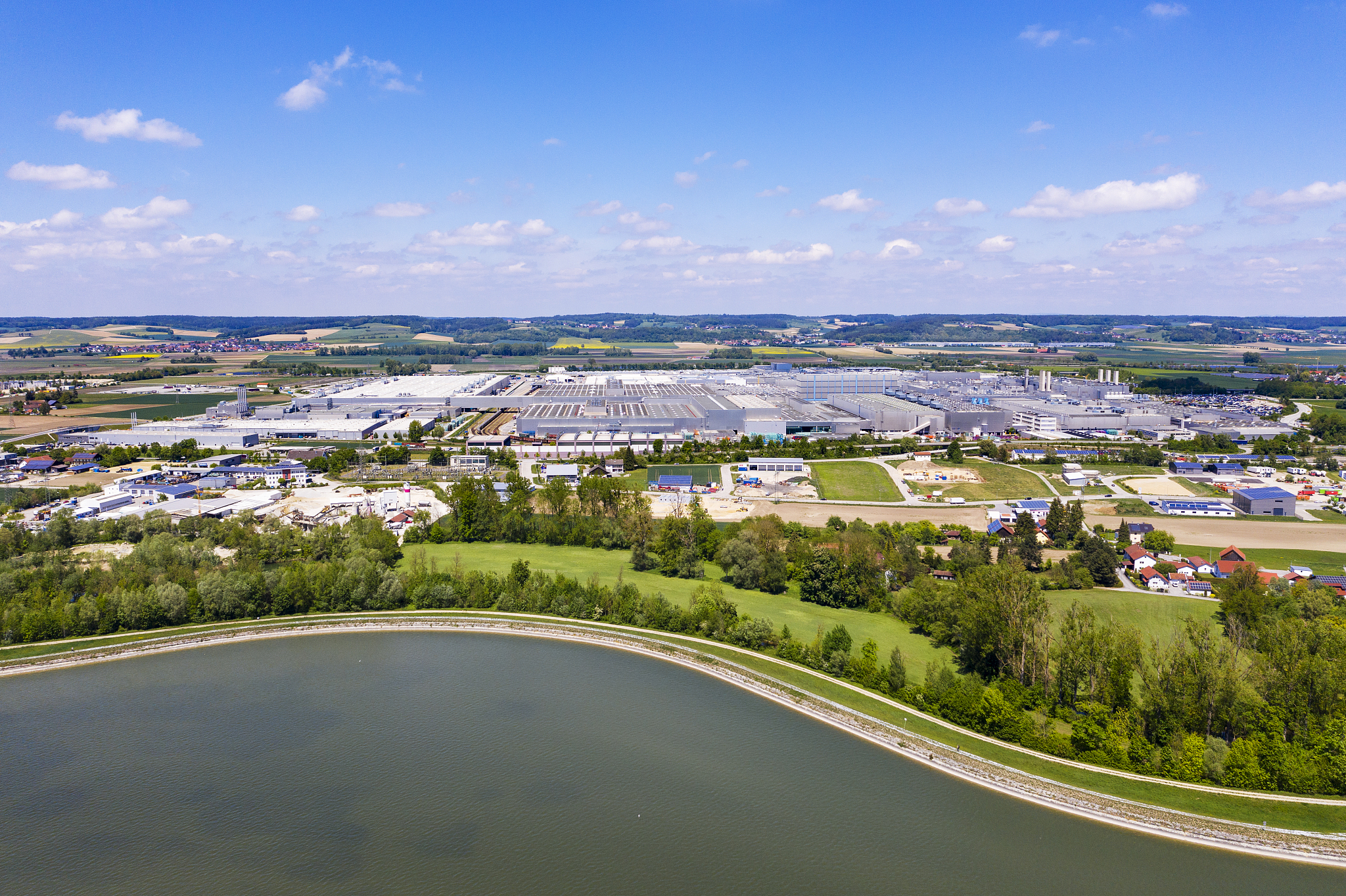 bmw plant and isar reservior dingolfing, bavaria, germany, drone
