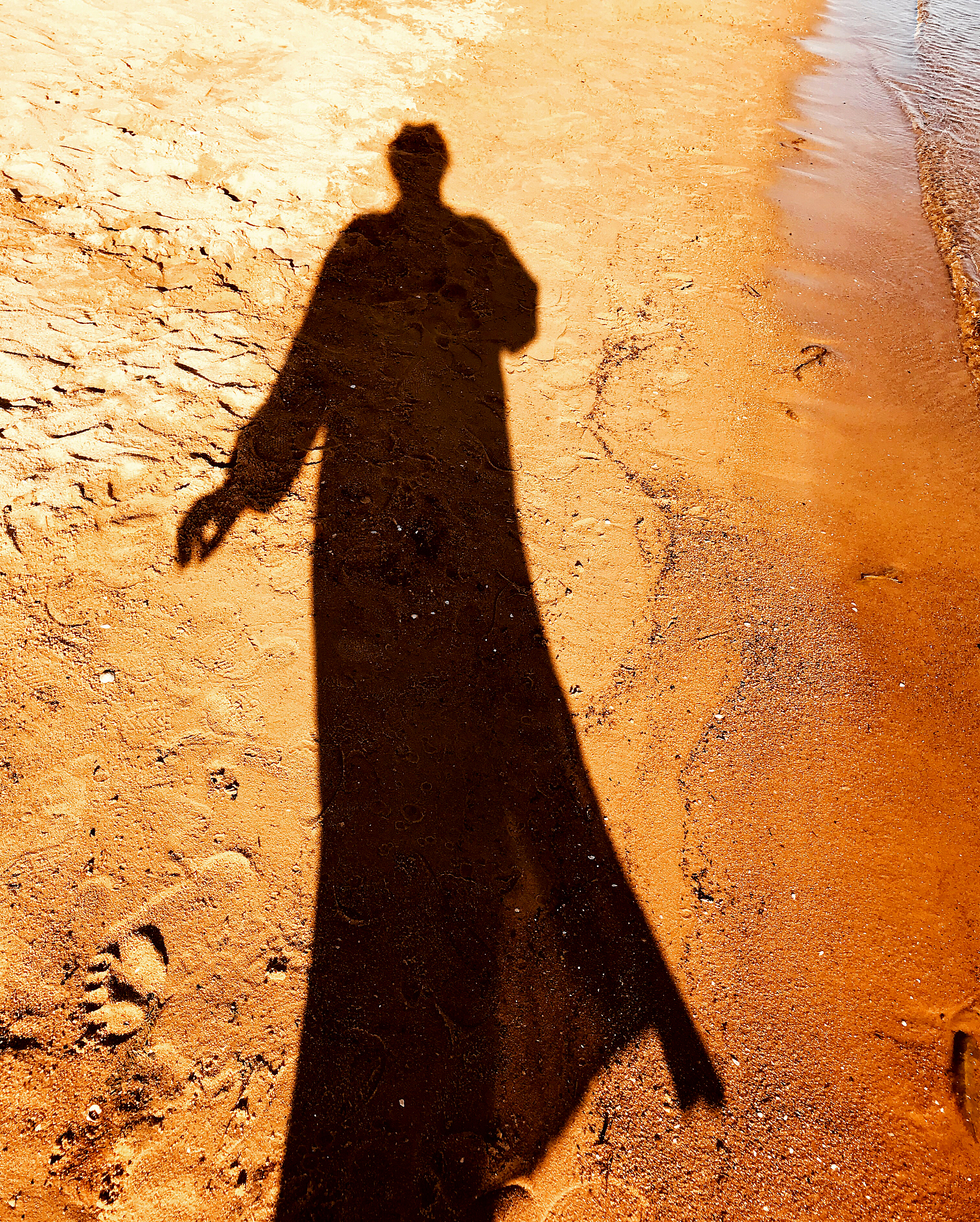 my own shadow on the sand