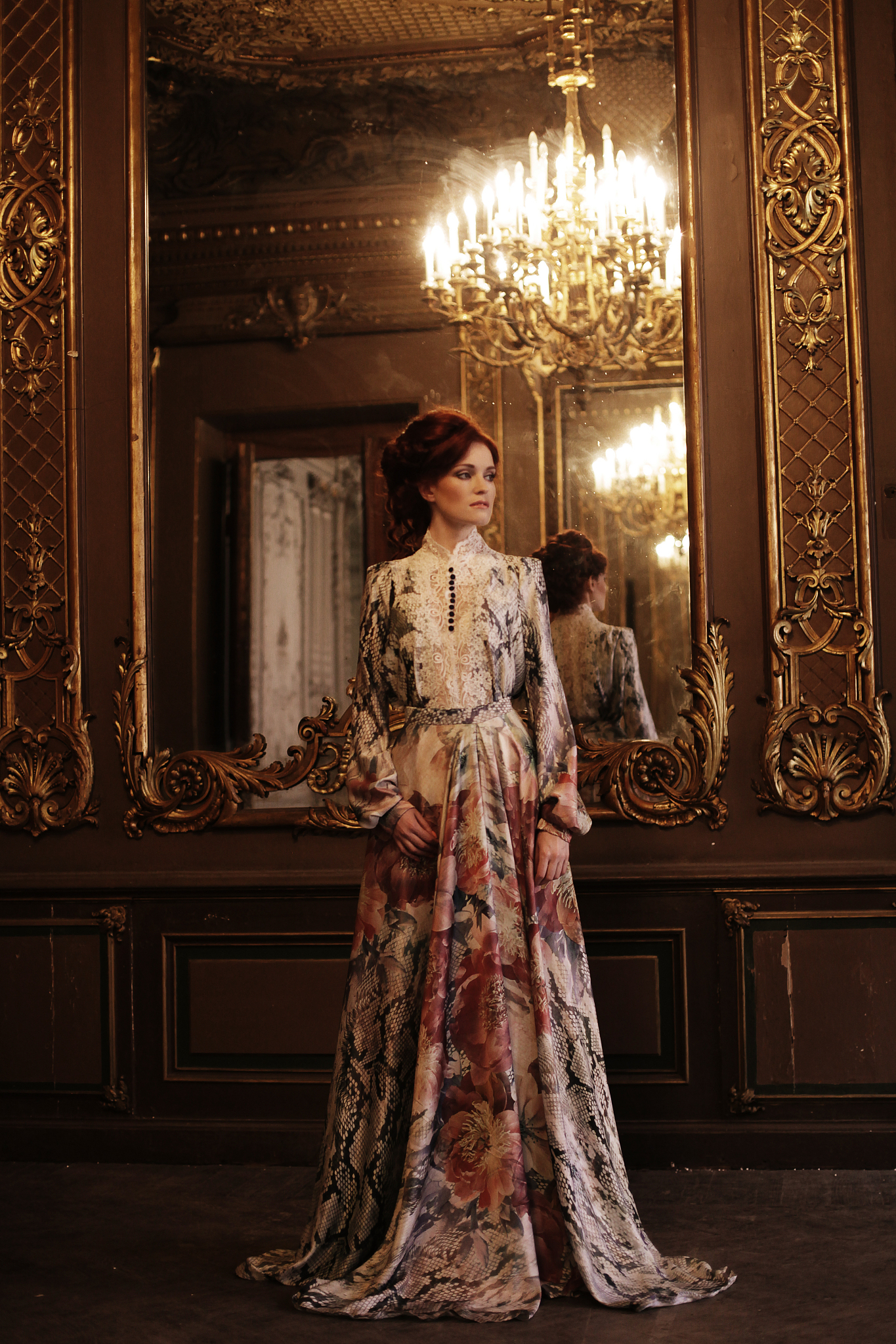 woman standing in the palace room with mirror.