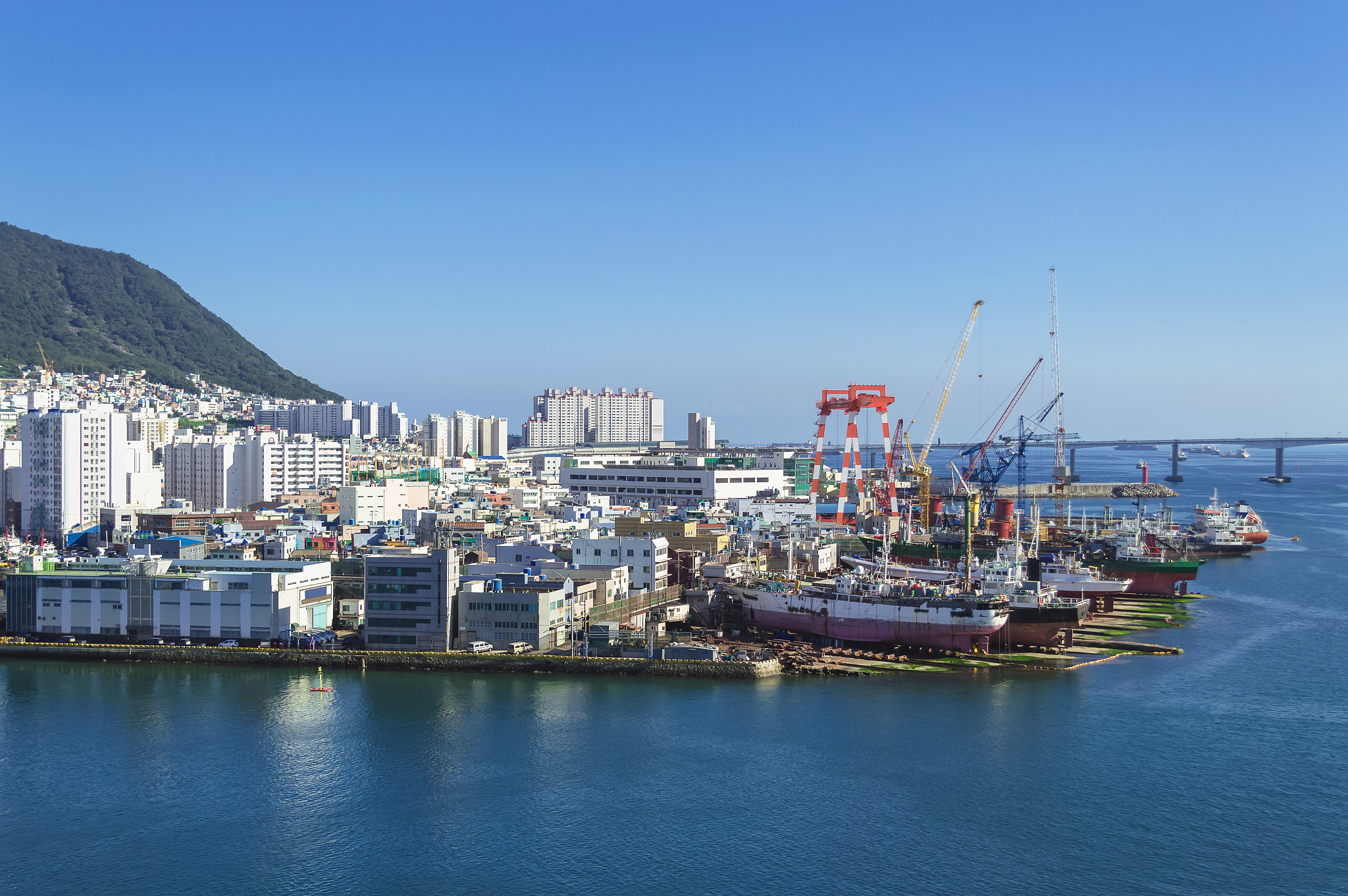 view from above on dock with shipways and cityscape of busan on 