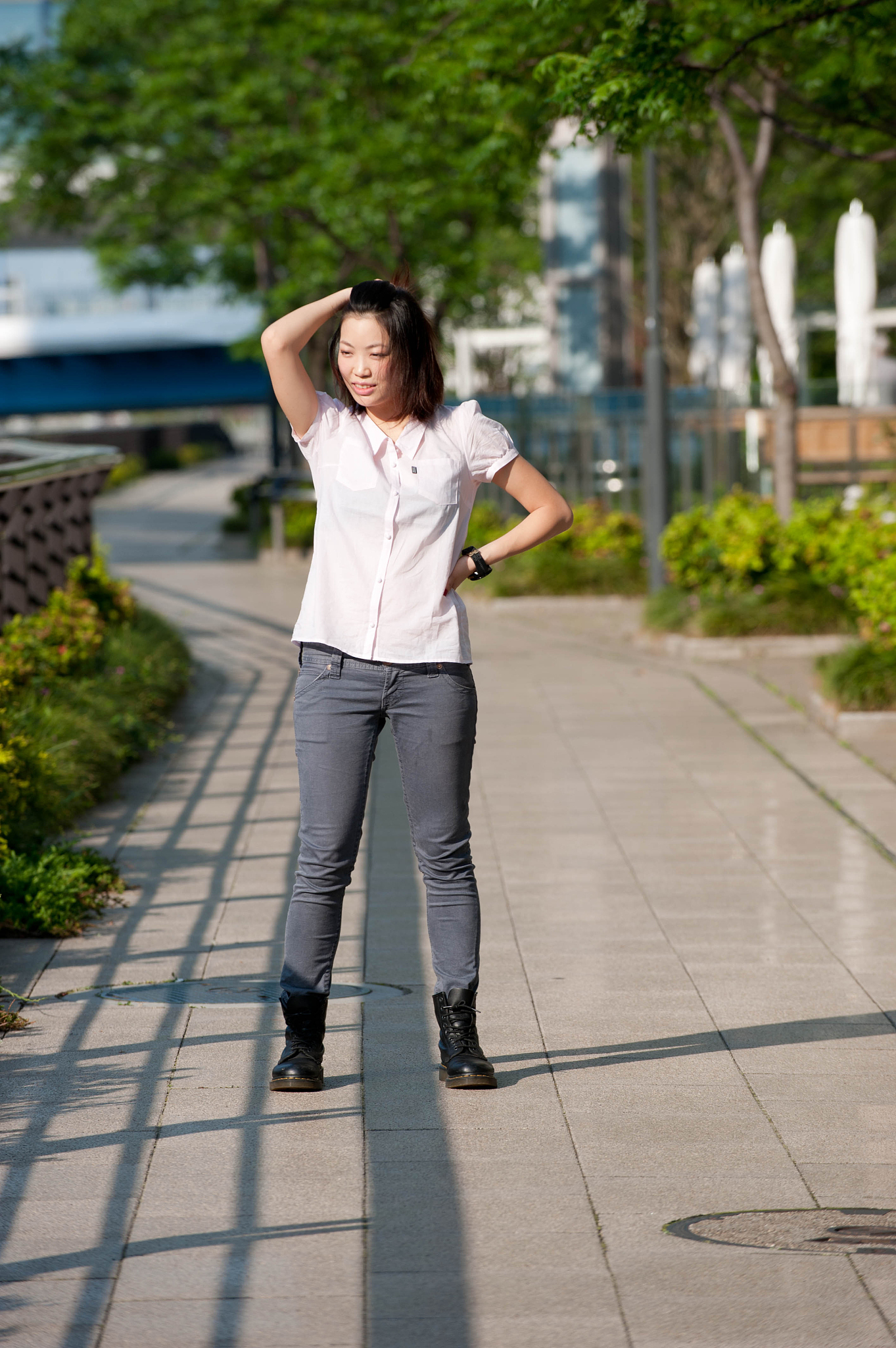 japanese girl poses on the street in tokyo, japan