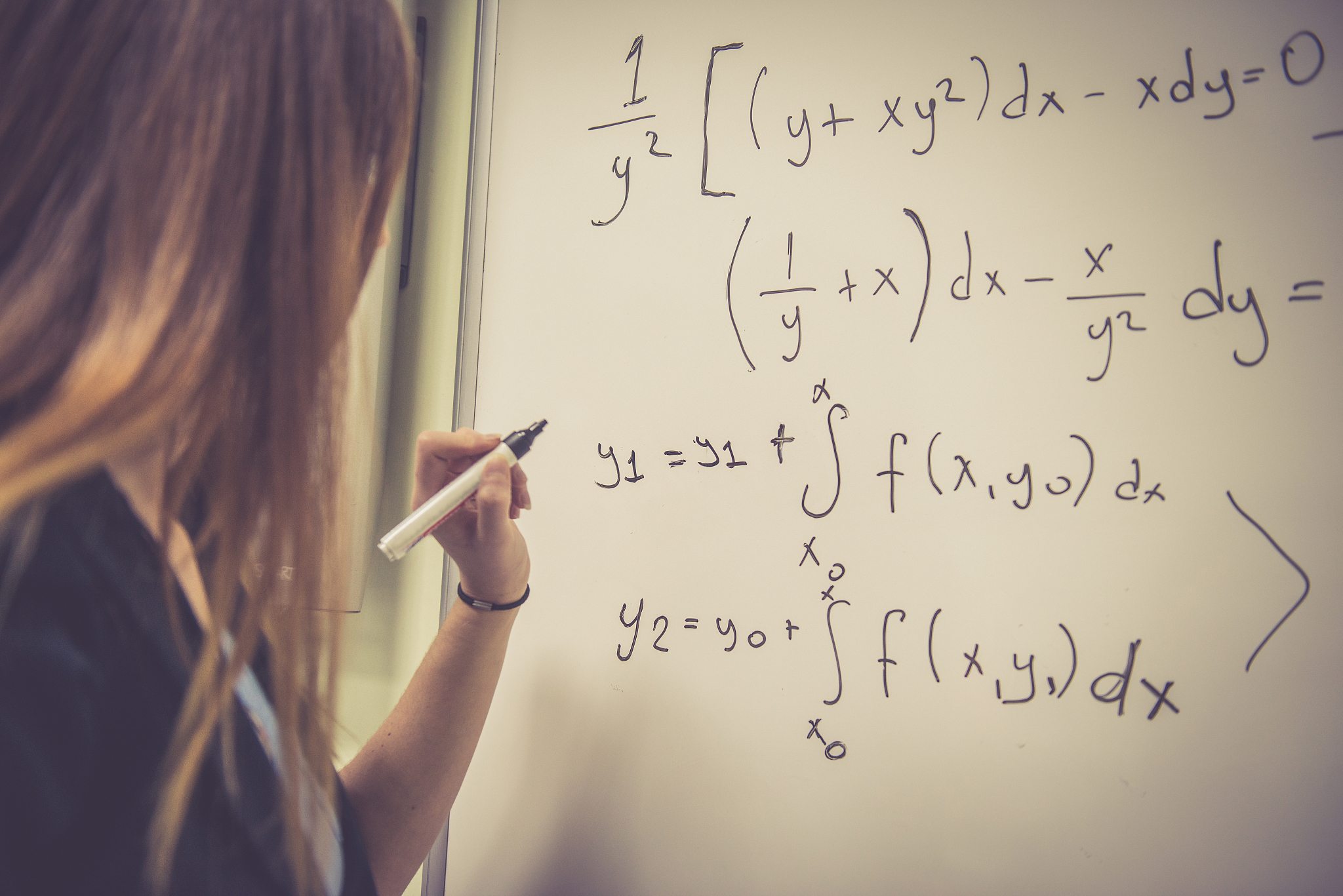 young woman doing math at secondary school, university, istanbul